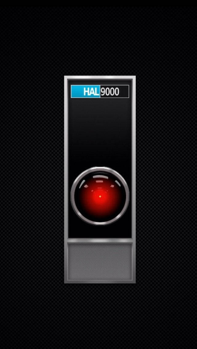高清 桌布 壁紙 — 一部時尚的黑色HAL 9000電腦，帶有發光的紅色眼睛和銀色裝飾，背景為深色。