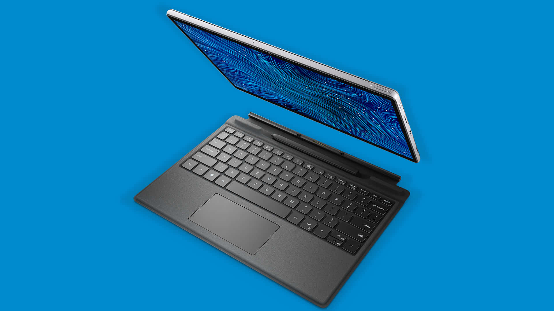 Dell 桌布 壁紙 — 一部時尚的黑色筆記型電腦，帶有藍色漩渦螢幕，漂浮在純藍色背景上。