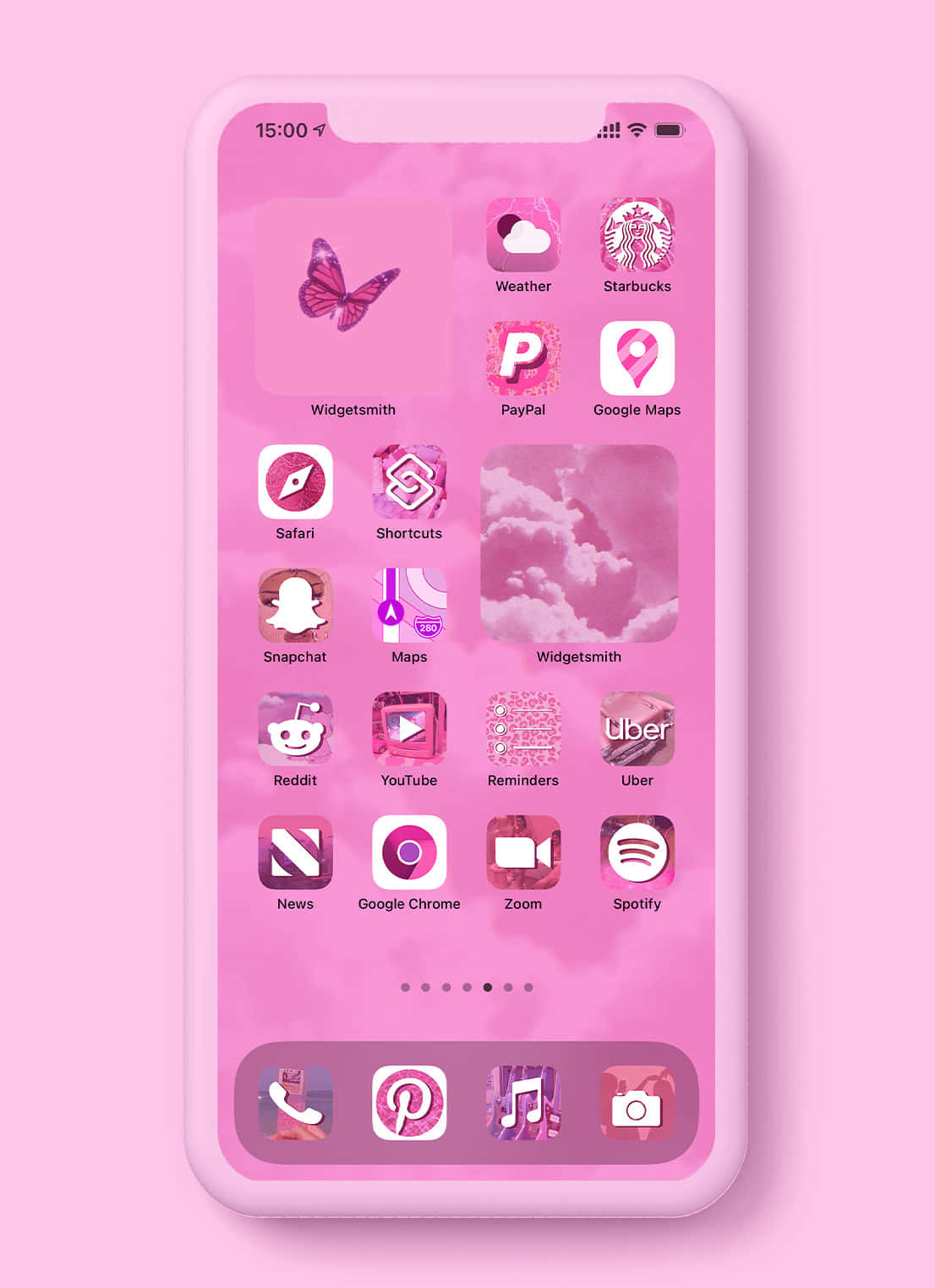 Pink Phone 桌布 壁紙 — 一部智慧型手機，帶有粉紅色漸層桌布，包含蝴蝶小工具和應用程式圖示，呈現柔和粉彩美學。
