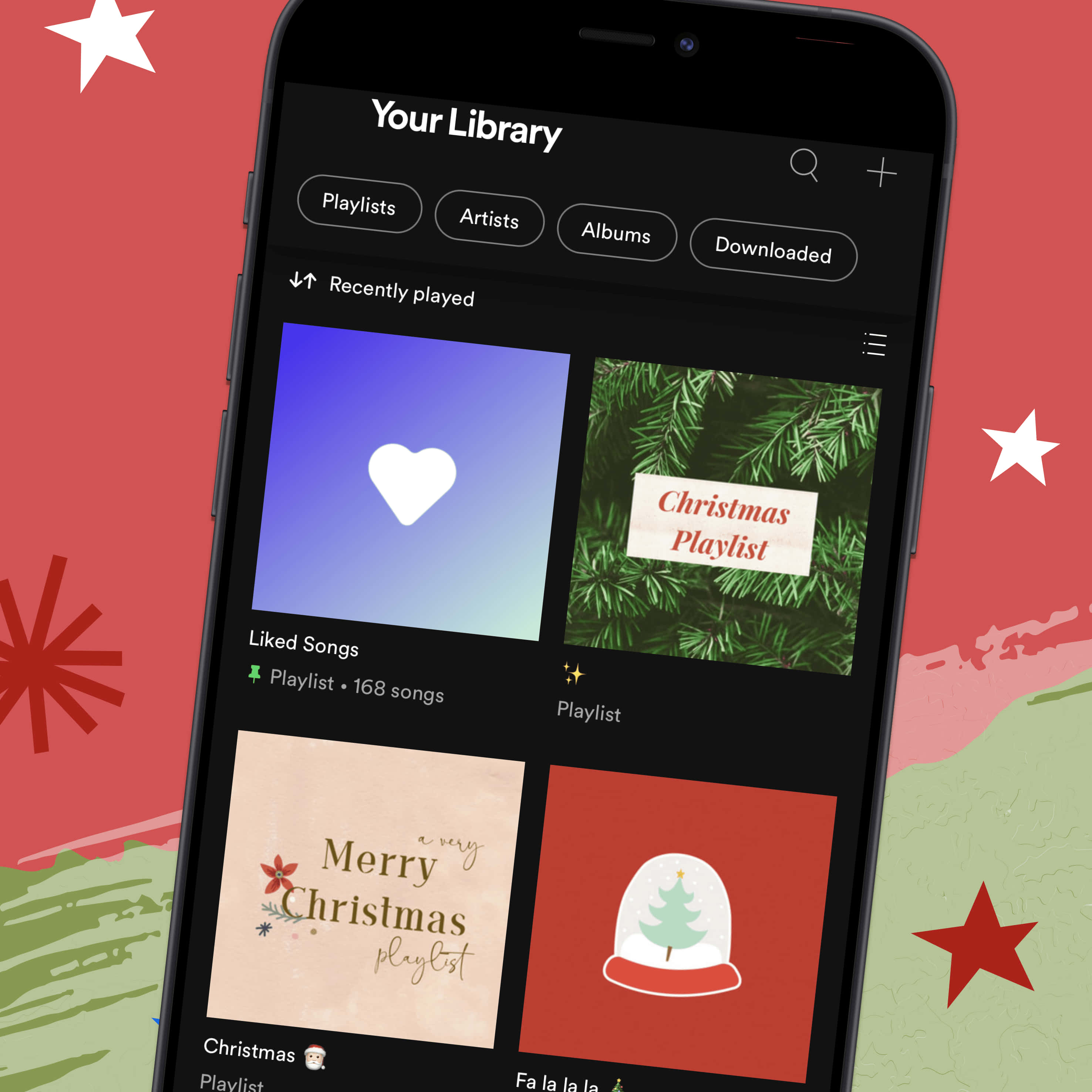 Spotify Playlist 桌布 壁紙 — 一部智慧型手機在帶有星星和雪花的節日紅色背景上顯示音樂應用程式的庫，其中包含聖誕播放清單。