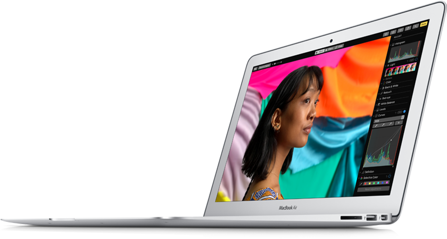 MacBook 動態圖片 桌布 壁紙 — 一部銀色 MacBook Air 顯示一個充滿活力的照片編輯介面，畫面中有一位女士的肖像，背景是色彩繽紛的布料。