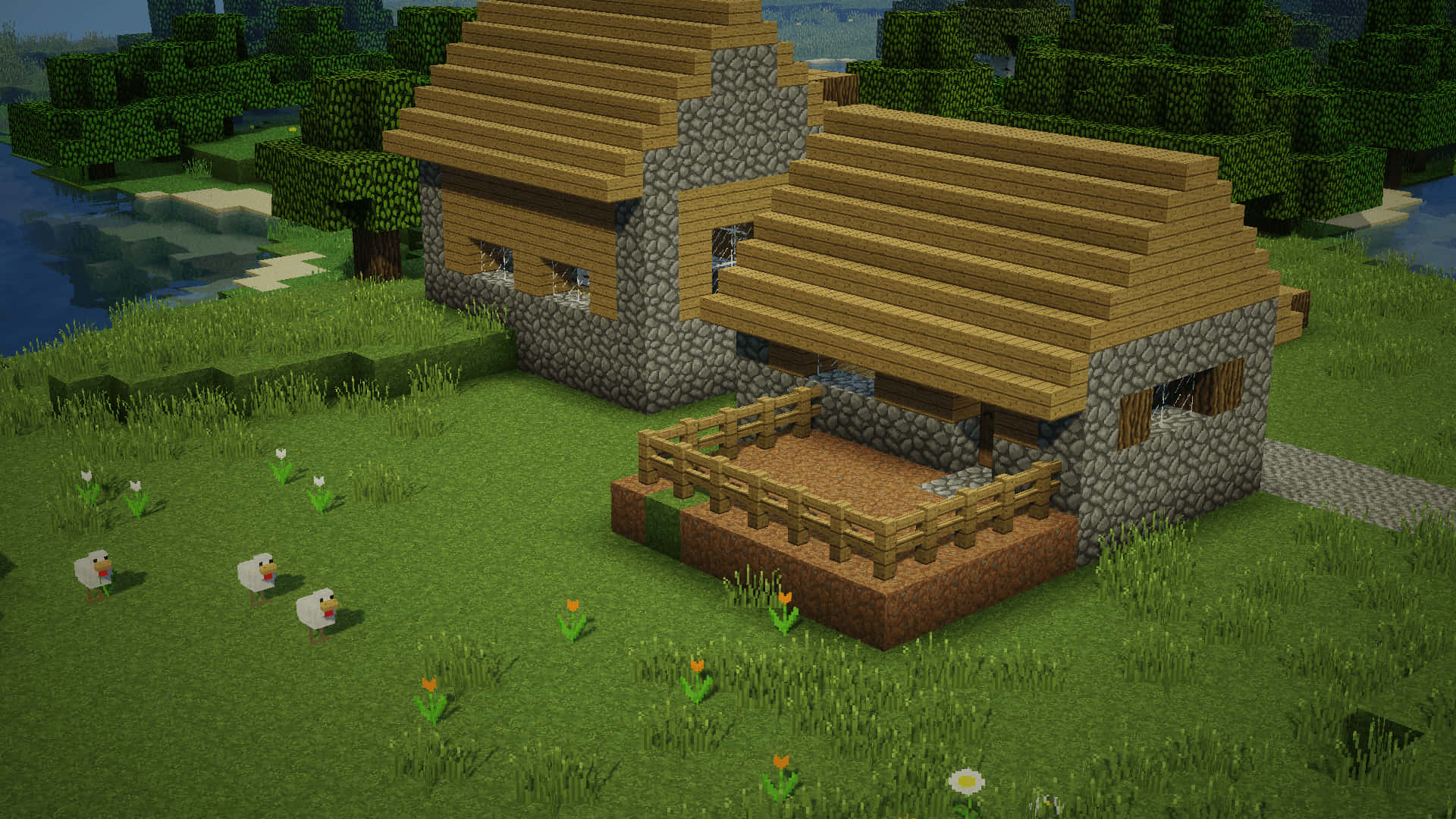Minecraft Shaders 桌布 壁紙 — 一間像素化的Minecraft農舍，石牆木頂，坐落在河邊，草地上有雞在吃草。