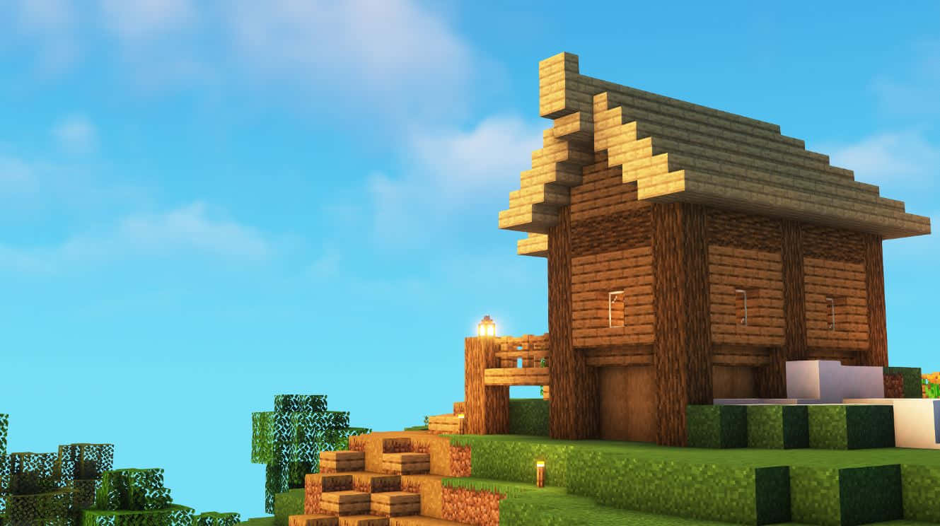 Minecraft Survival 桌布 壁紙 — 一間像素化的木屋，帶有傾斜屋頂，坐落於草地山丘上，天空晴朗湛藍，有 fluffy 雲朵。