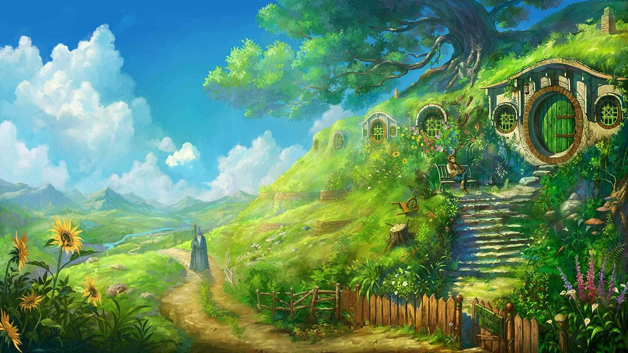桌布 壁紙 — 一間奇幻的哈比屋，坐落在翠綠的山丘上，上方是藍天白雲。