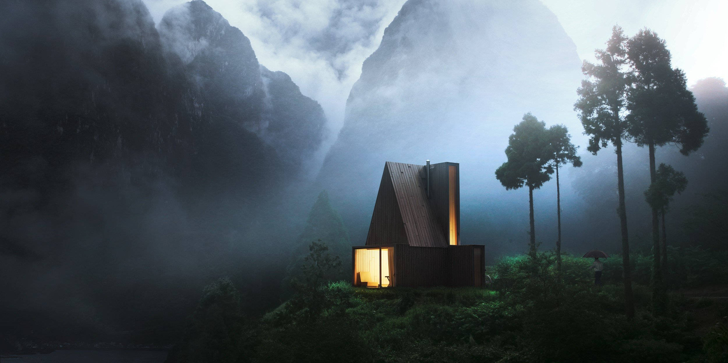 Wood House 桌布 壁紙 — 一間孤獨的木屋，窗戶透出溫暖的光芒，坐落在霧氣繚繞的山巒中，周圍是高聳的樹木，天空多雲。