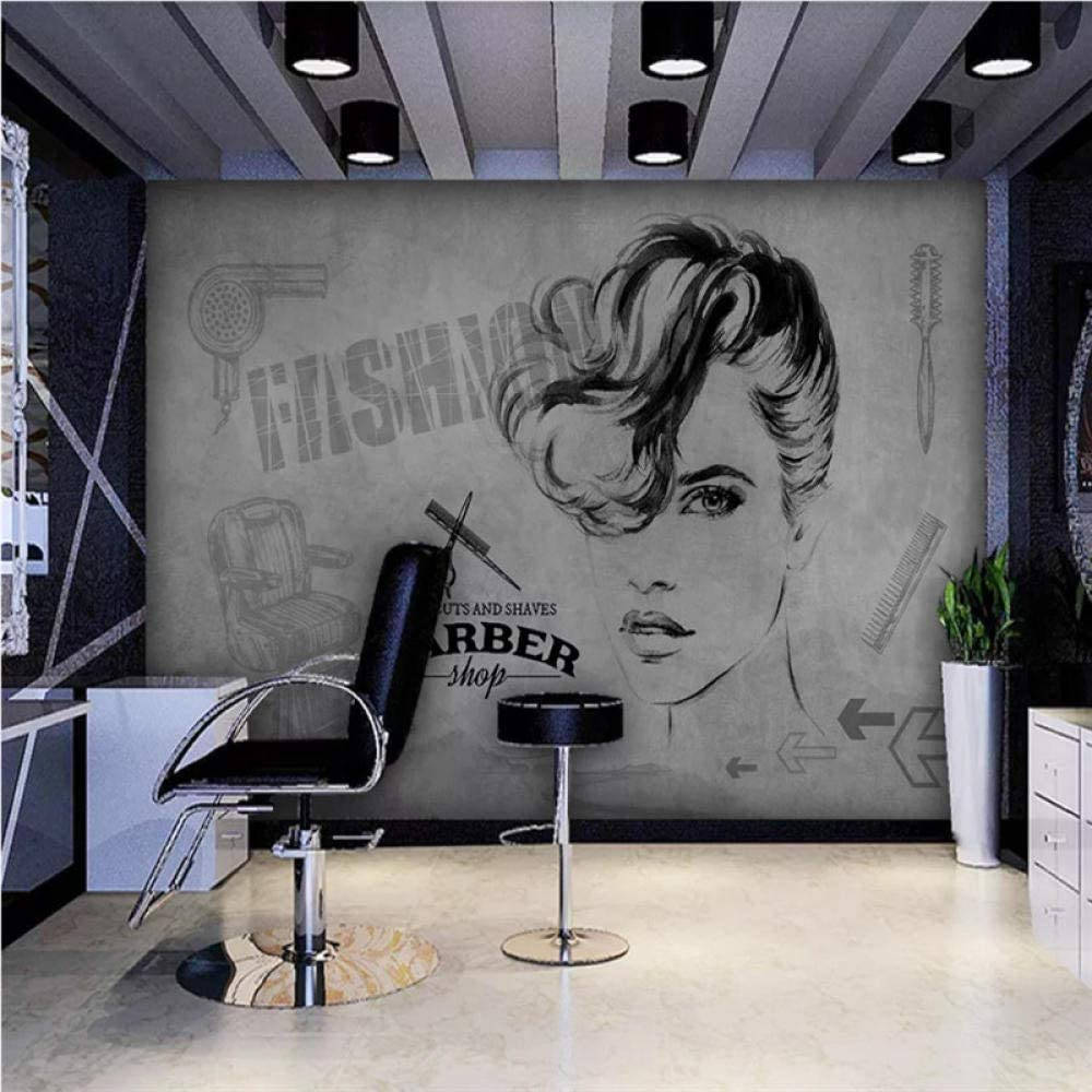 Hair Salon 桌布 壁紙 — 一間復古理髮店的內部設有一幅大型壁畫，描繪時尚女性的臉龐，配有美髮工具和 'BARBER shop' 字樣。
