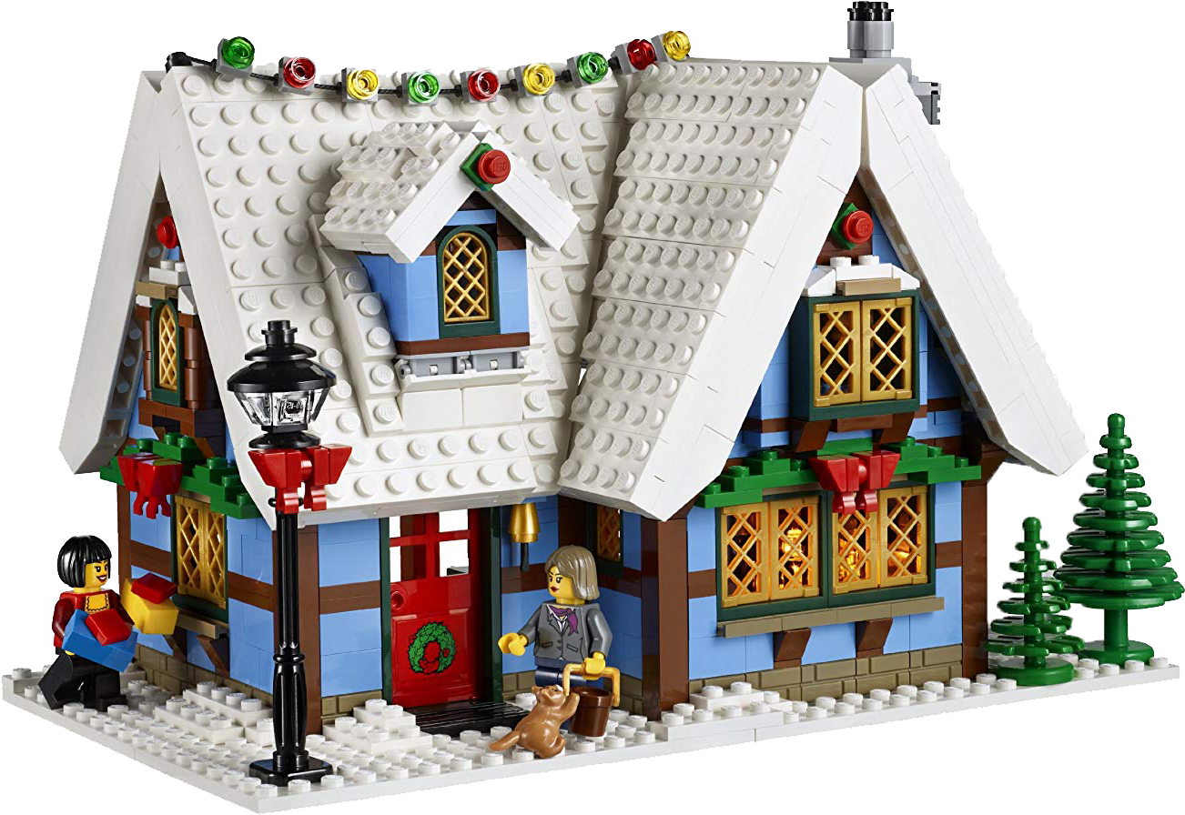 房屋 桌布 壁紙 — 一間節日氣氛的LEGO冬季小屋，屋頂覆蓋白雪，掛滿彩色燈飾，門口有兩個迷你人偶在迎接。