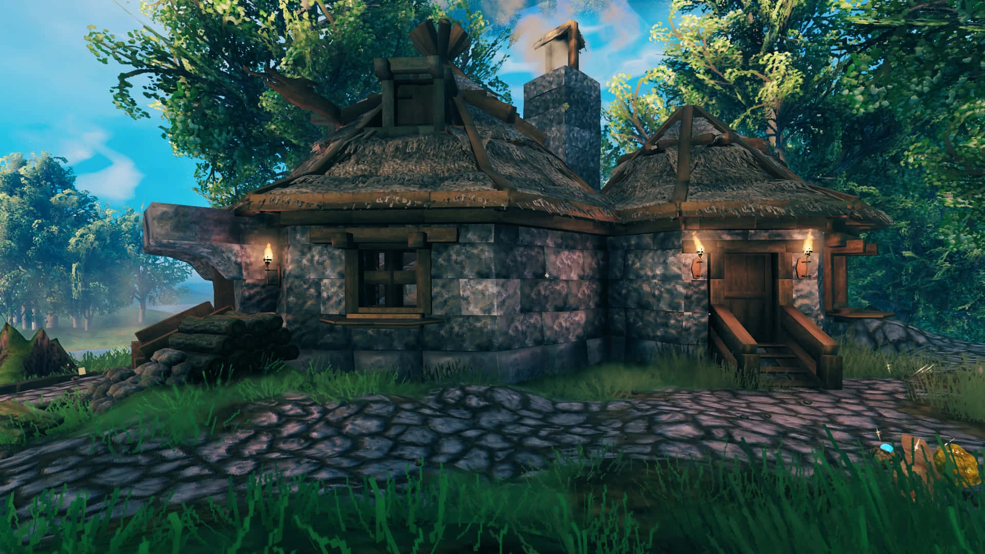 Hagrid's Hut 桌布 壁紙 — 一間質樸的石屋，茅草屋頂，坐落在鬱鬱蔥蔥的綠色森林中，頭頂是明亮的藍天。