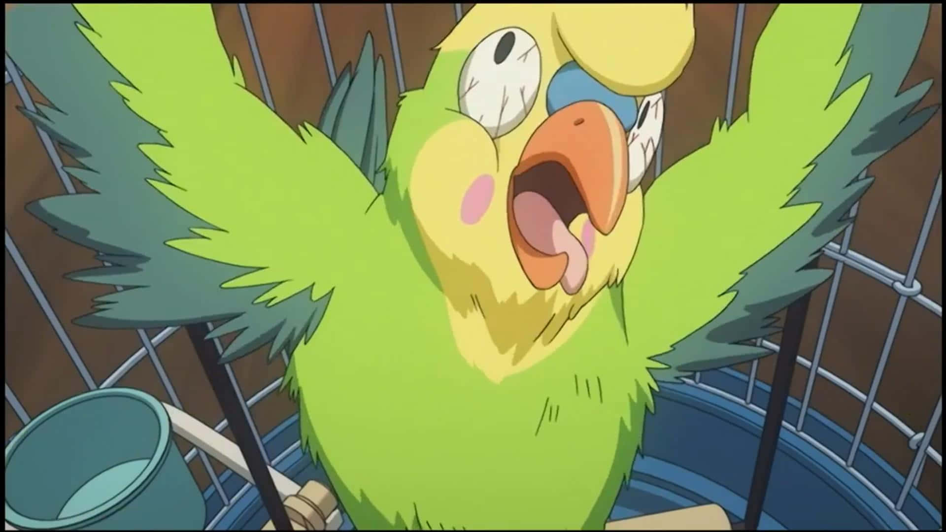 Toradora Inko 桌布 壁紙 — 一隻亮綠色卡通鸚鵡，睜大眼睛，張開鳥喙，在金屬籠子裡興奮地大叫。