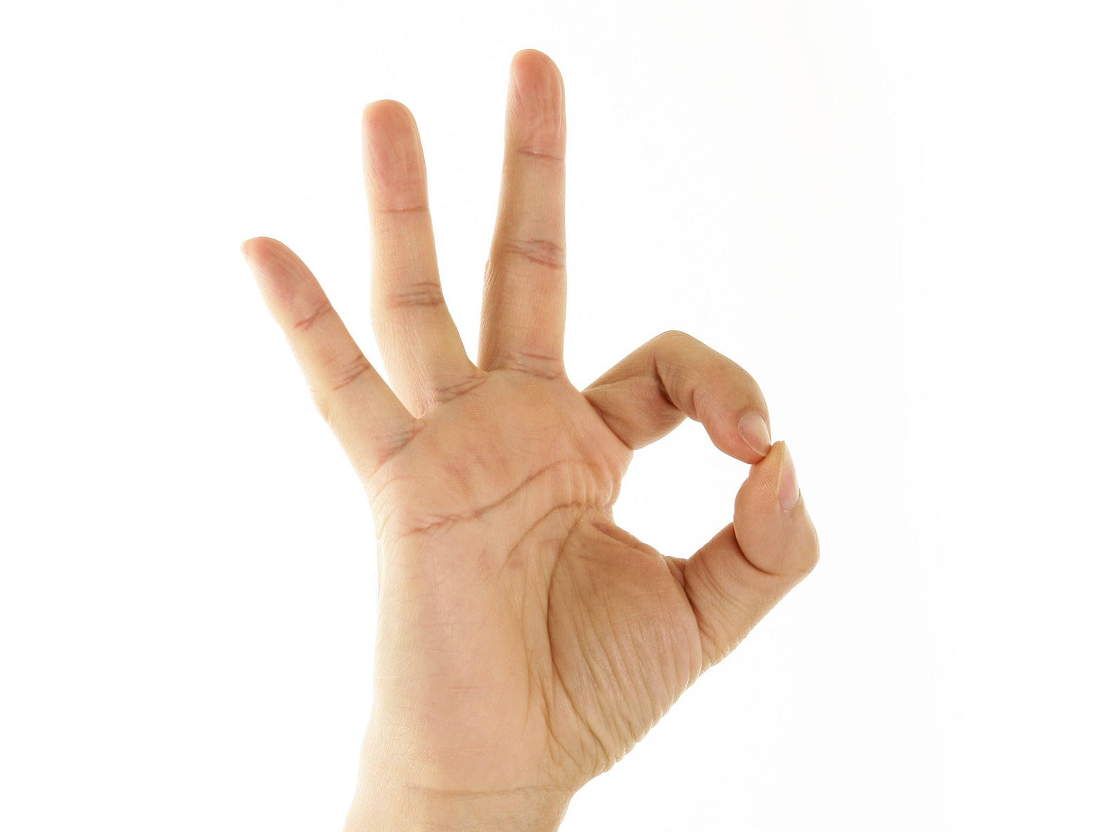 hands up 桌布 壁紙 — 一隻人類手部在純白色背景前做出「OK」手勢的特寫。