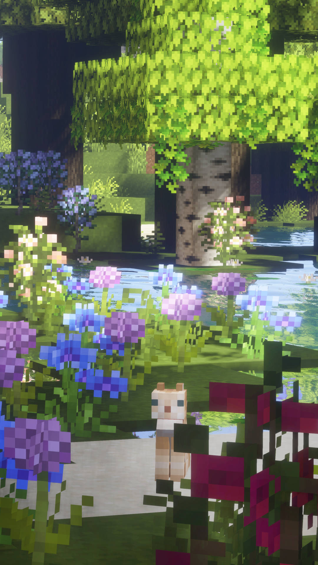 Garden 桌布 壁紙 — 一隻像素化的Minecraft貓站在一個充滿活力的花園中，有盛開的花朵和茂密的樹木，在明亮的日光下。