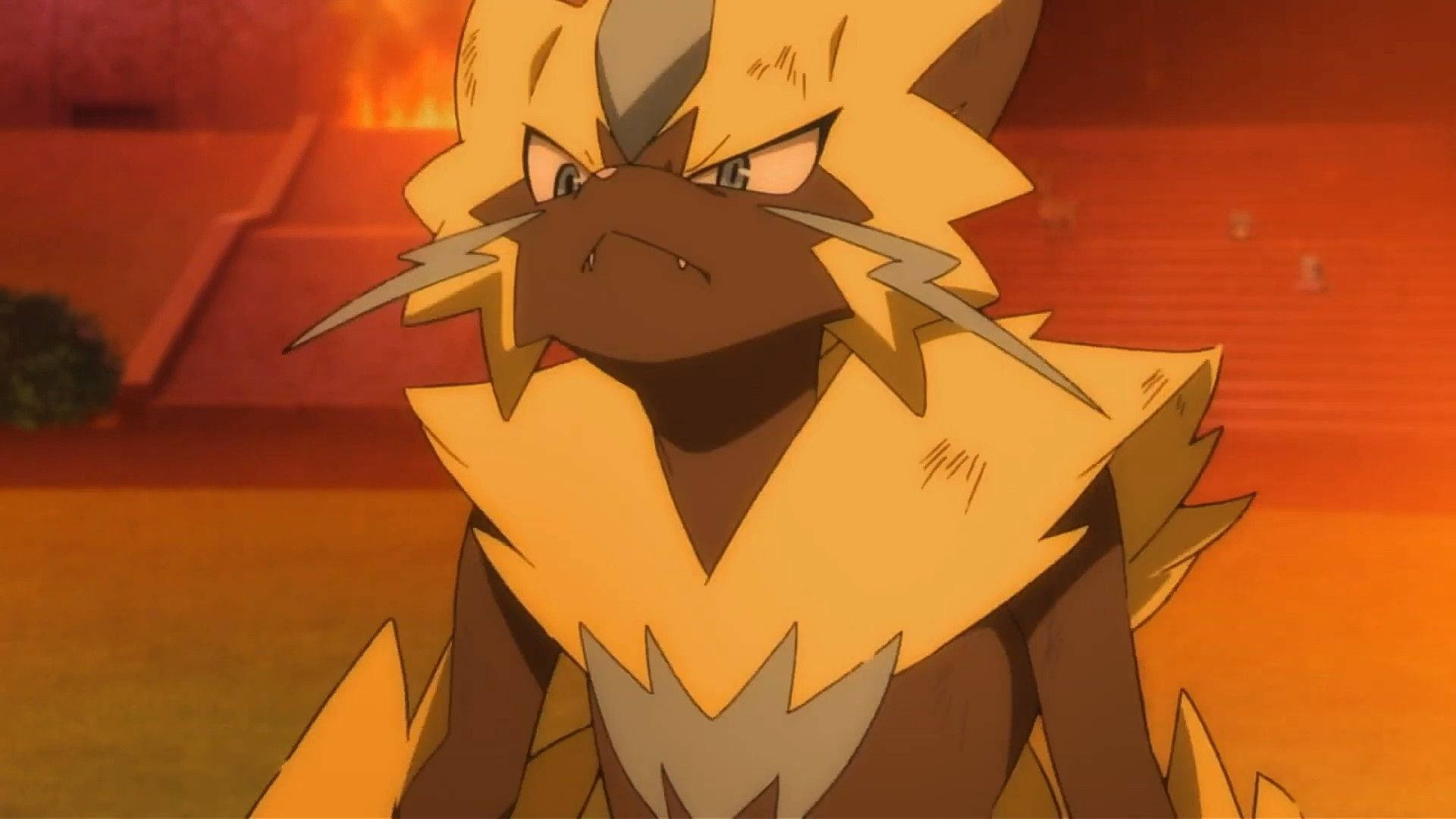 Zeraora 桌布 壁紙 — 一隻兇猛的動畫寶可夢，有尖刺的黃色毛髮和憤怒的眼睛，在火橙色背景前怒視。