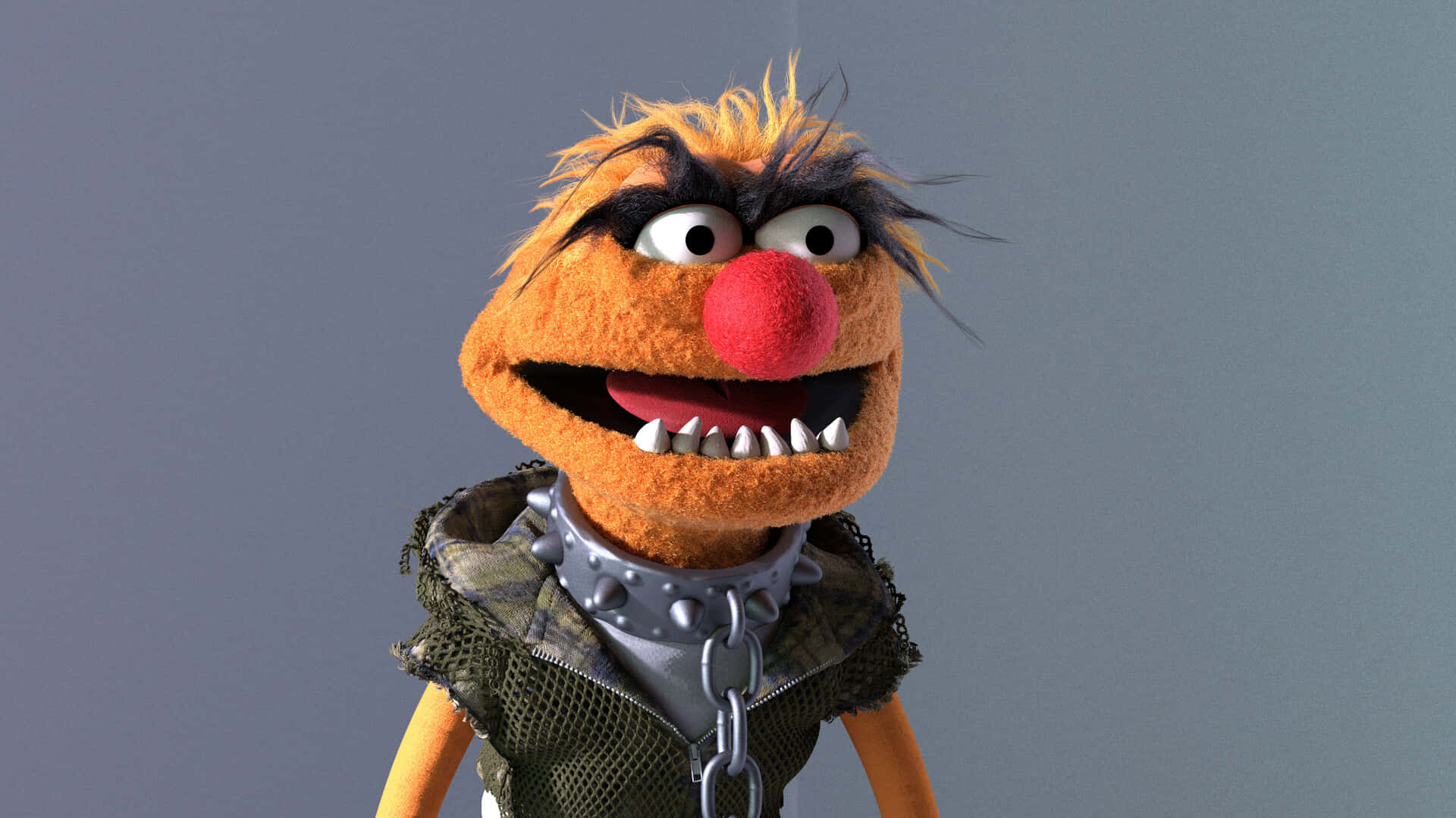 Animal Muppet 桌布 壁紙 — 一隻兇猛的橙色Muppet，有著狂野的頭髮和尖刺項圈，在純灰色背景前強烈凝視。