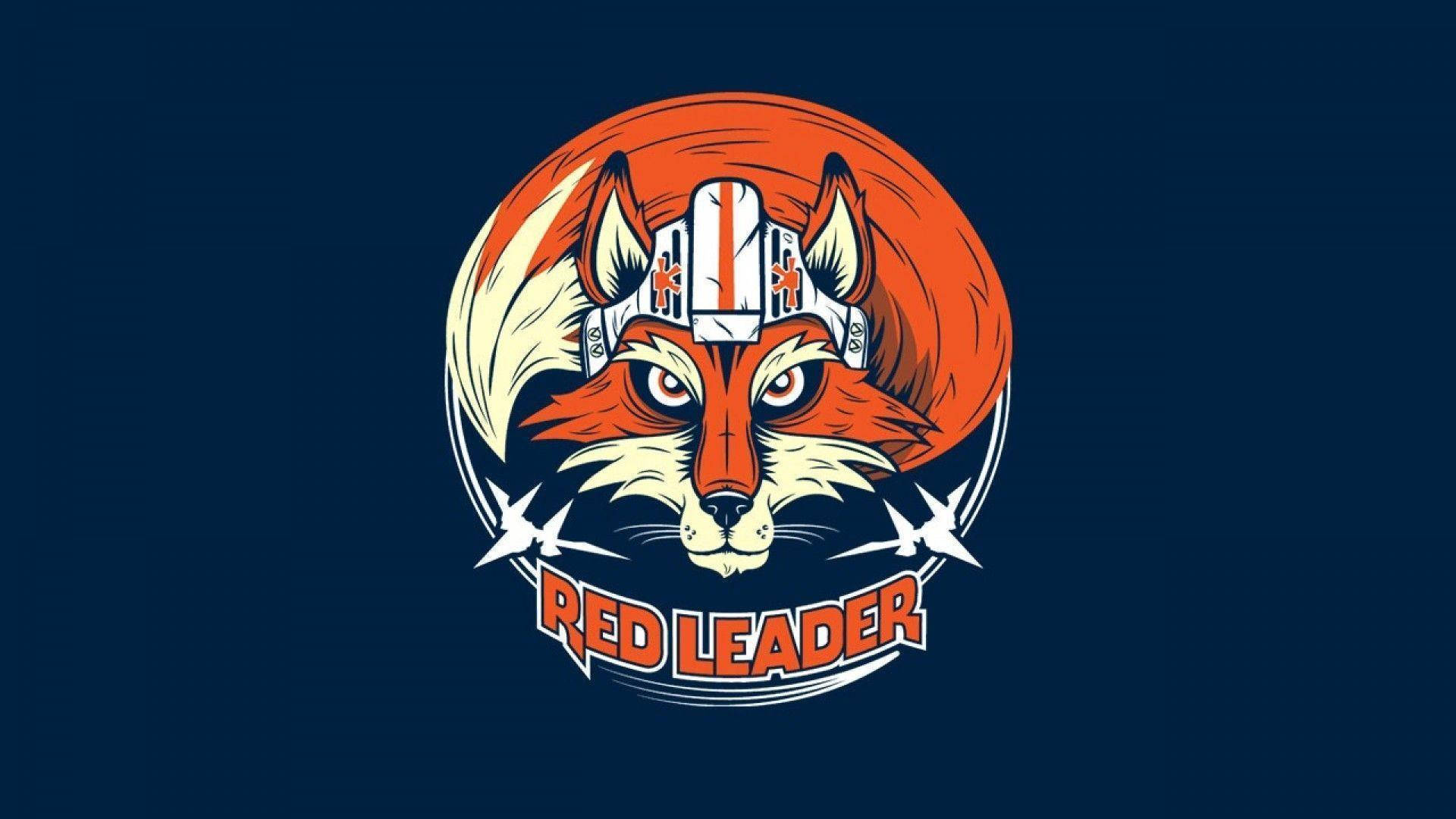 Star Fox 桌布 壁紙 — 一隻兇猛的紅狐戴著帶有橙色點綴的白色頭盔，在深藍色背景的圓形徽章內向前凝視。