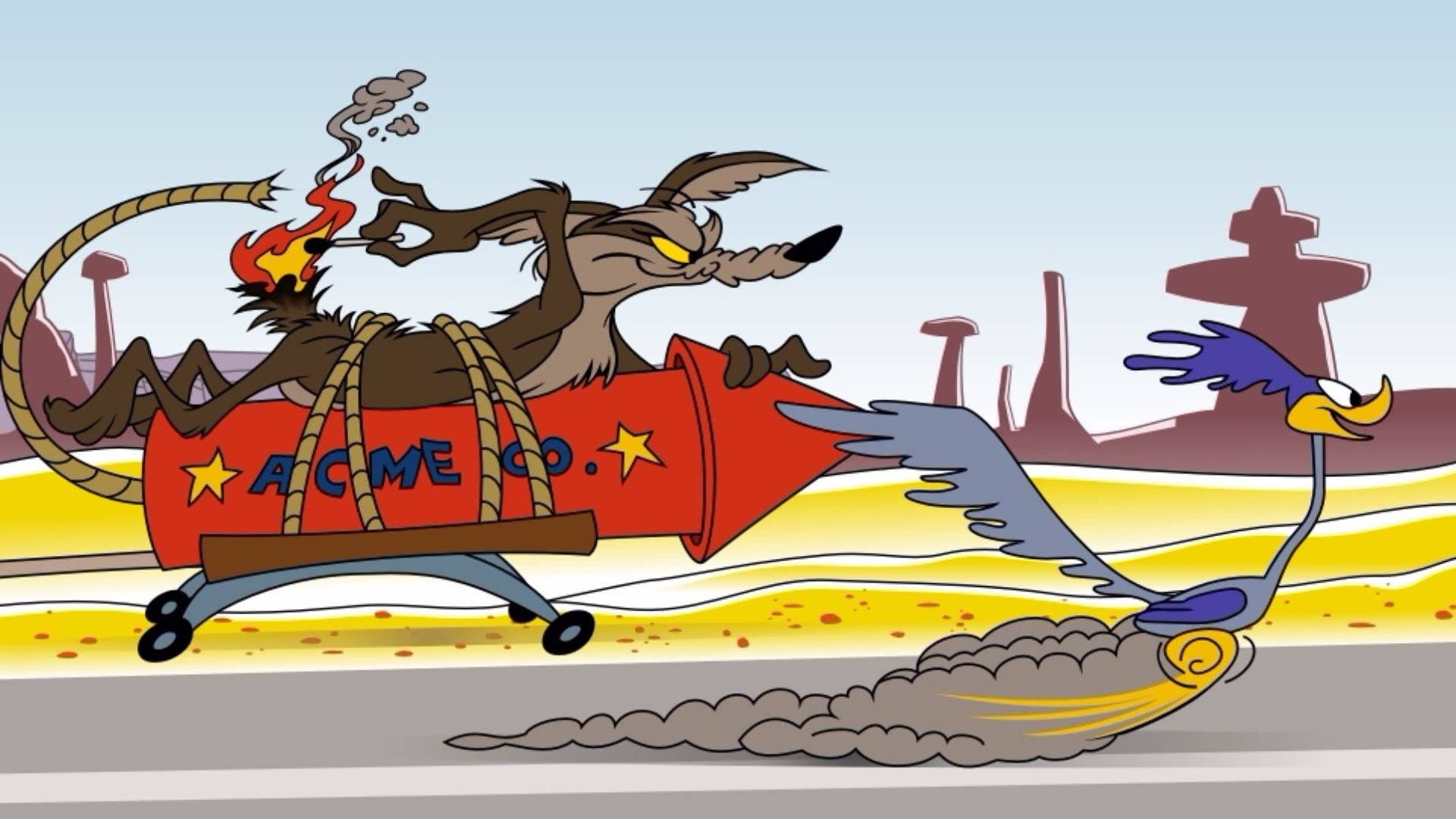 Coyote 桌布 壁紙 — 一隻卡通土狼被綁在火箭車上，在沙漠公路上追逐一隻藍色走鵑。