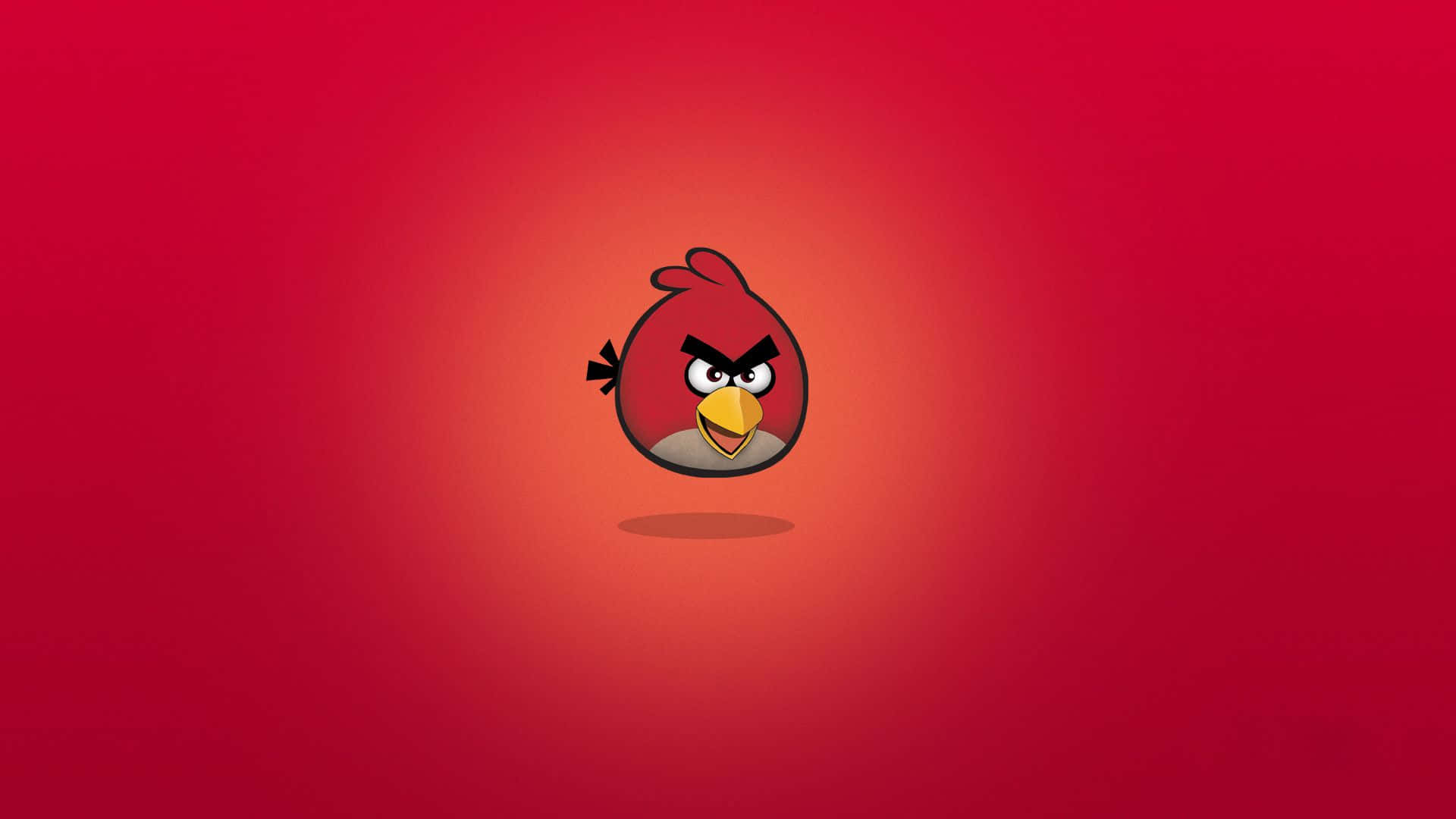 Angry Birds 桌布 壁紙 — 一隻卡通紅色憤怒鳥，黃色喙和黑色眉毛，漂浮在漸變紅色背景上。