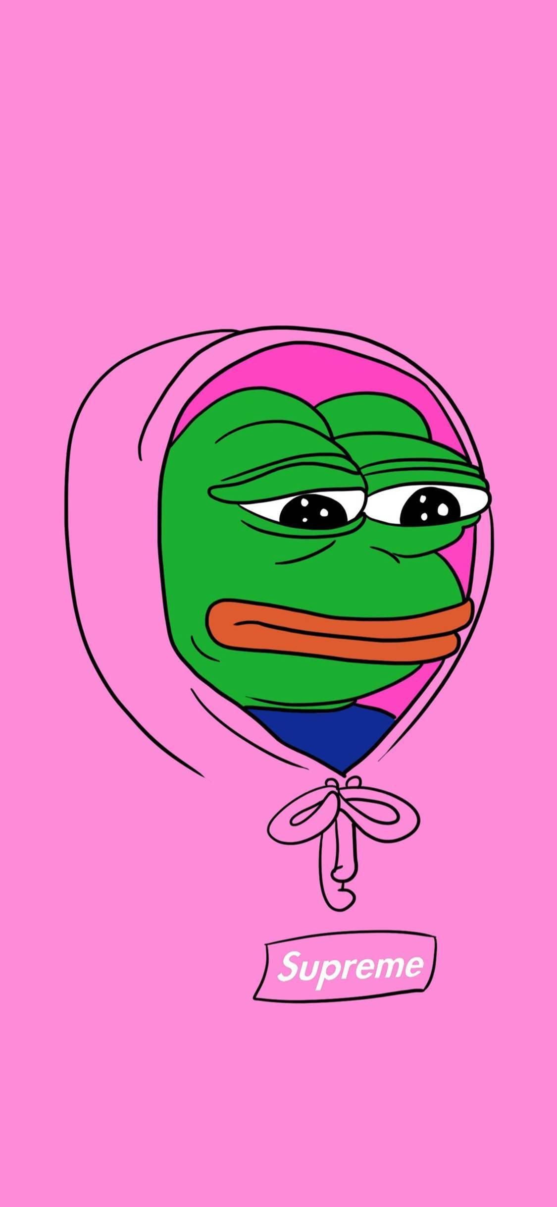 Pepe 桌布 壁紙 — 一隻卡通青蛙穿著連帽衫和領結，漂浮在純粉紅色背景上，下方有Supreme標誌。