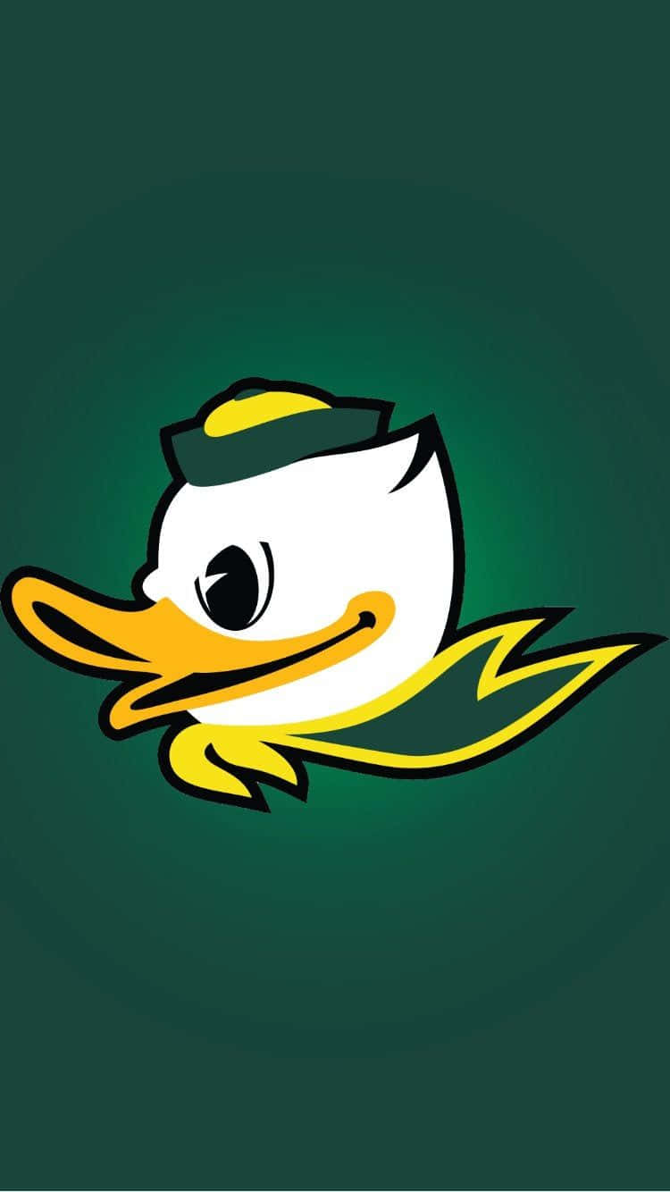 Oregon Ducks 桌布 壁紙 — 一隻卡通鴨子吉祥物穿著綠色和黃色的裝備，在深綠色漸變背景上微笑。