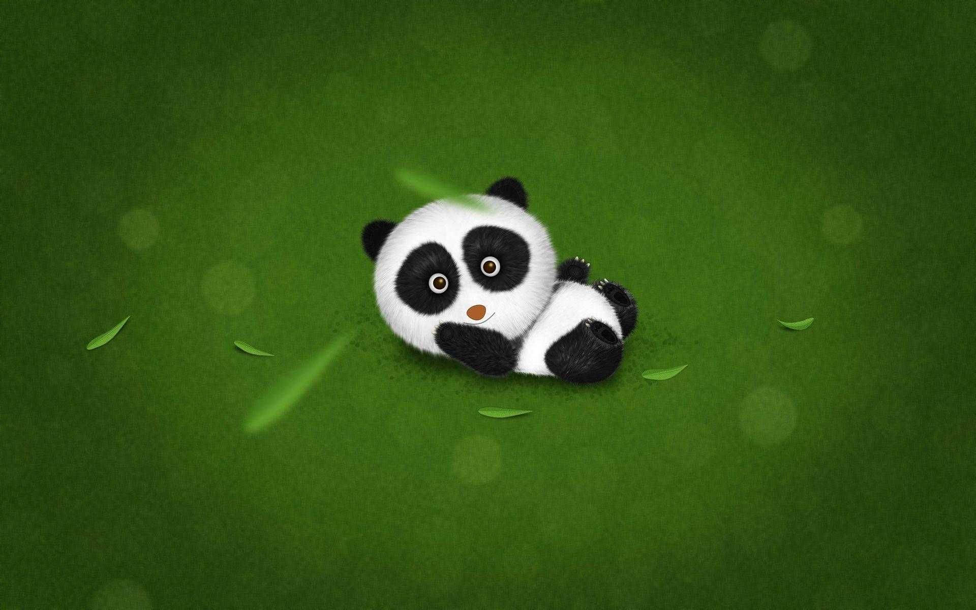 Cute Panda 桌布 壁紙 — 一隻可愛毛茸茸的熊貓寶寶蜷縮在充滿活力的綠色草地上，散落著樹葉和柔和的散景背景。