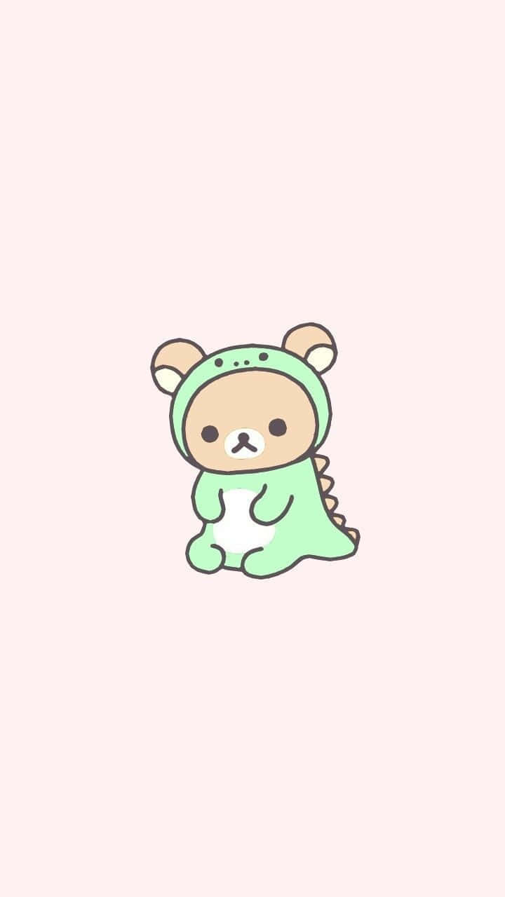 Cute Animals Cartoon 桌布 壁紙 — 一隻可愛的卡通熊穿著淺綠色恐龍服裝，坐在柔軟的粉紅色背景中央。