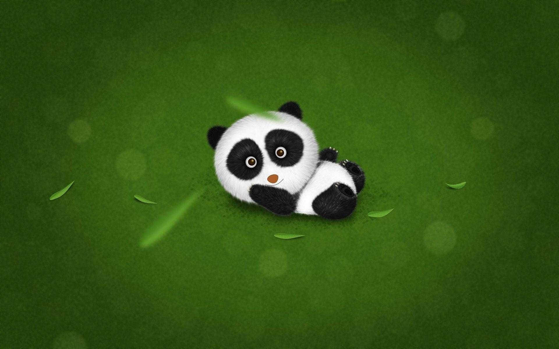 熊貓 桌布 壁紙 — 一隻可愛的卡通熊貓寶寶蜷縮在柔軟的綠色草地上，周圍散落著樹葉和散景光效。