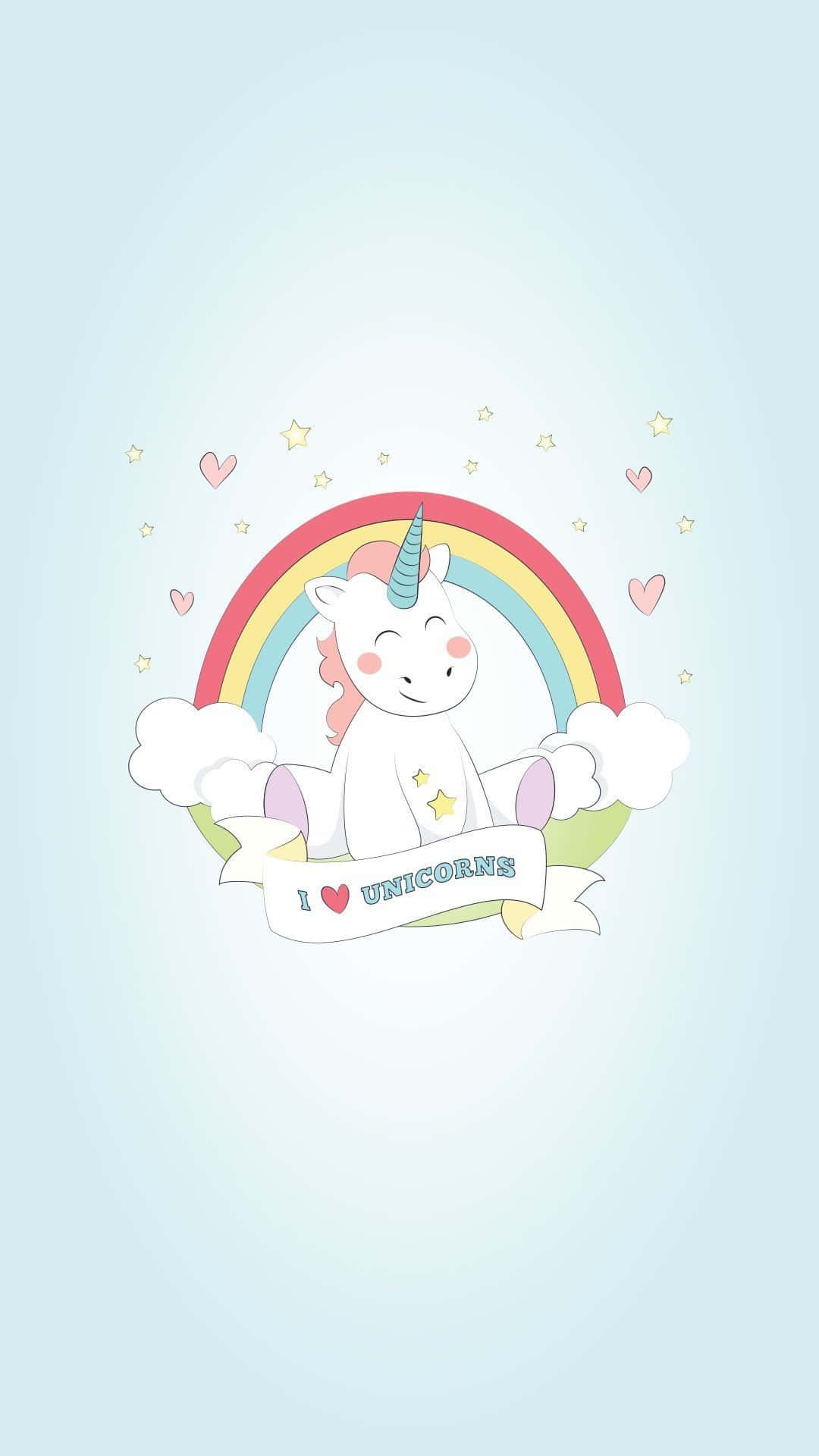 Kawaii Unicorn 桌布 壁紙 — 一隻可愛的卡通獨角獸坐在彩虹下，拿著寫有「I ❤️ UNICORNS」的橫幅，周圍環繞著星星和愛心。