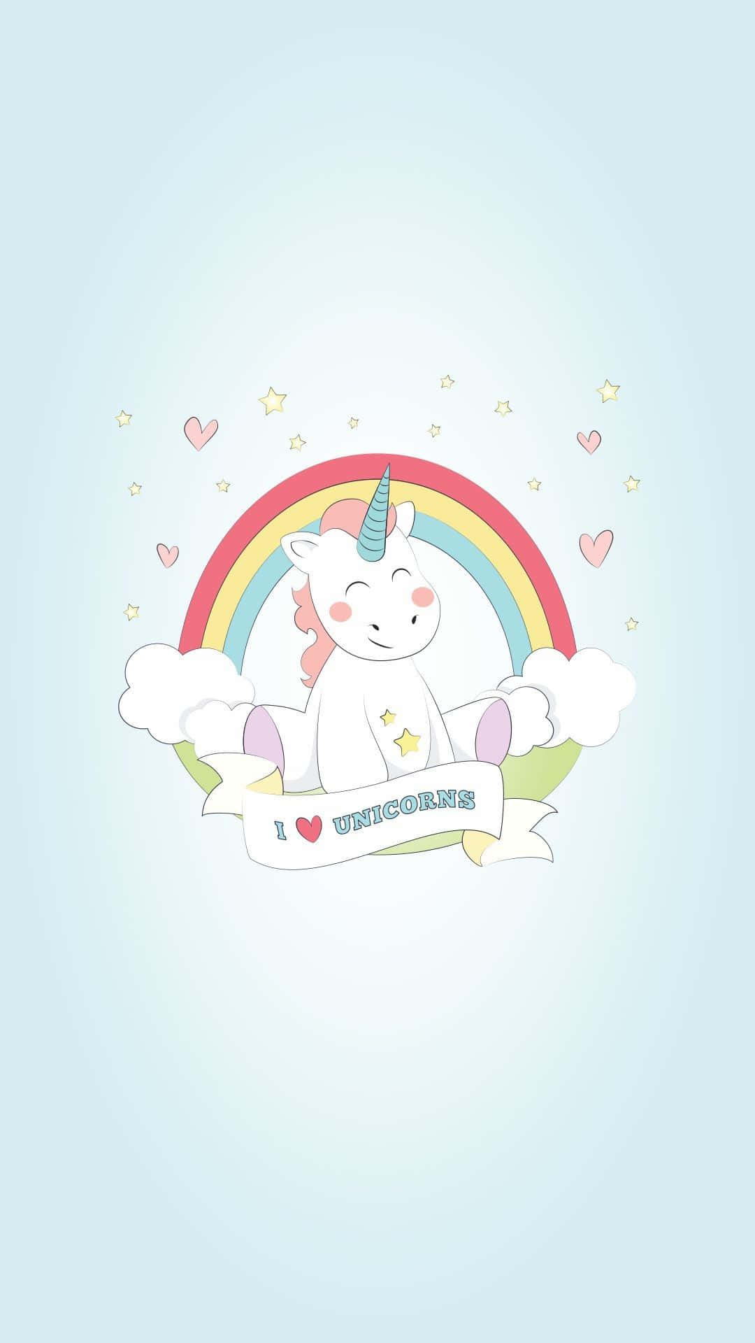獨角獸 桌布 壁紙 — 一隻可愛的卡通獨角獸坐在色彩繽紛的彩虹下，舉著寫有「I heart unicorns」的橫幅，周圍環繞著星星和愛心。