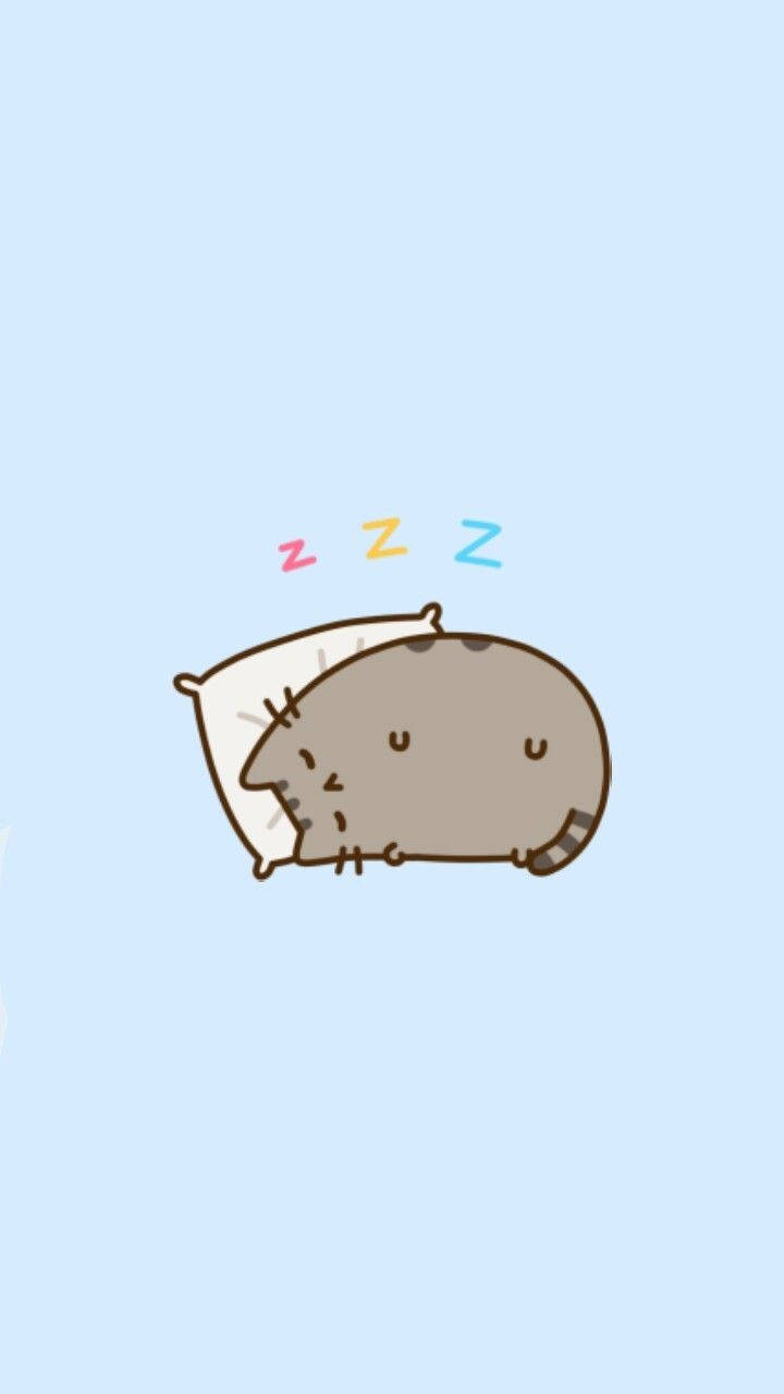 pusheen 動圖 桌布 壁紙 — 一隻可愛的卡通貓咪在枕頭上安詳地睡覺，頭頂上有彩色zzz氣泡漂浮，背景是柔和的藍色。