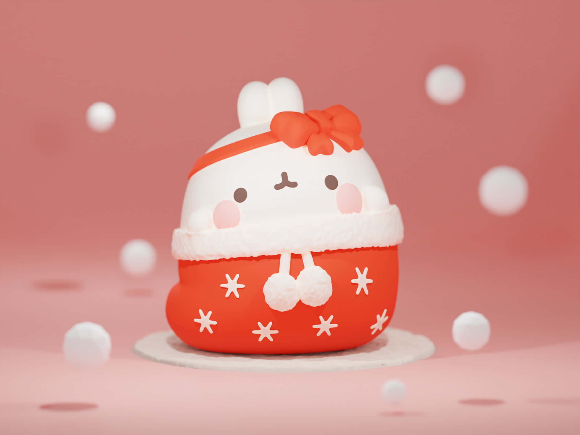 3d Christmas 桌布 壁紙 — 一隻可愛的白兔穿著紅色雪花毛衣和帶蝴蝶結的帽子，坐在粉紅色背景上，周圍有漂浮的雪球。