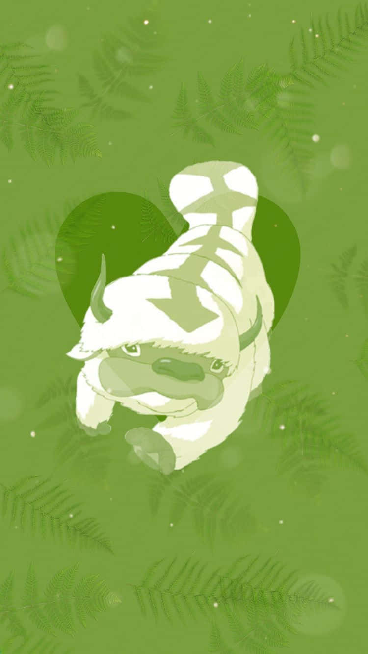 降世神通 最後的氣宗 桌布 壁紙 — 一隻可愛的白綠條紋卡通牛生物，有角和心形陰影，漂浮在綠色背景的蕨類植物中。