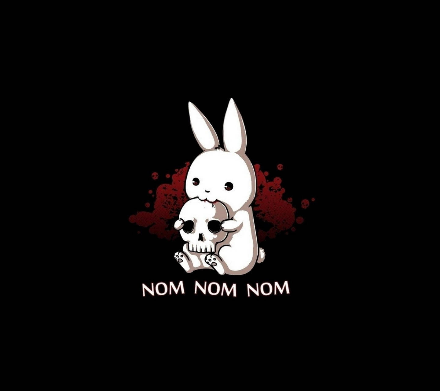 Cute Bunny 桌布 壁紙 — 一隻可愛的白色卡通兔子拿著一個後面有紅色噴濺的骷髏頭，並在黑色背景上寫有 nom nom nom 的文字。