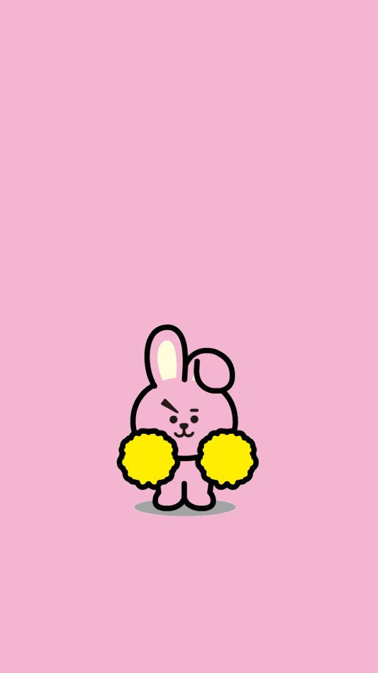 Cooky Bt21 桌布 壁紙 — 一隻可愛的粉紅色卡通兔子，帶有黑色輪廓，在純粉紅色背景上拿著黃色絨球。