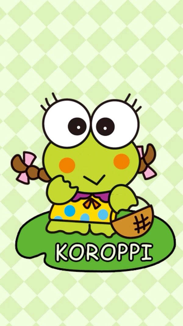 Keroppi 桌布 壁紙 — 一隻可愛的綠色卡通青蛙，有大眼睛和辮子，坐在荷葉上，拿著一個籃子，背景是淺綠色格子圖案。