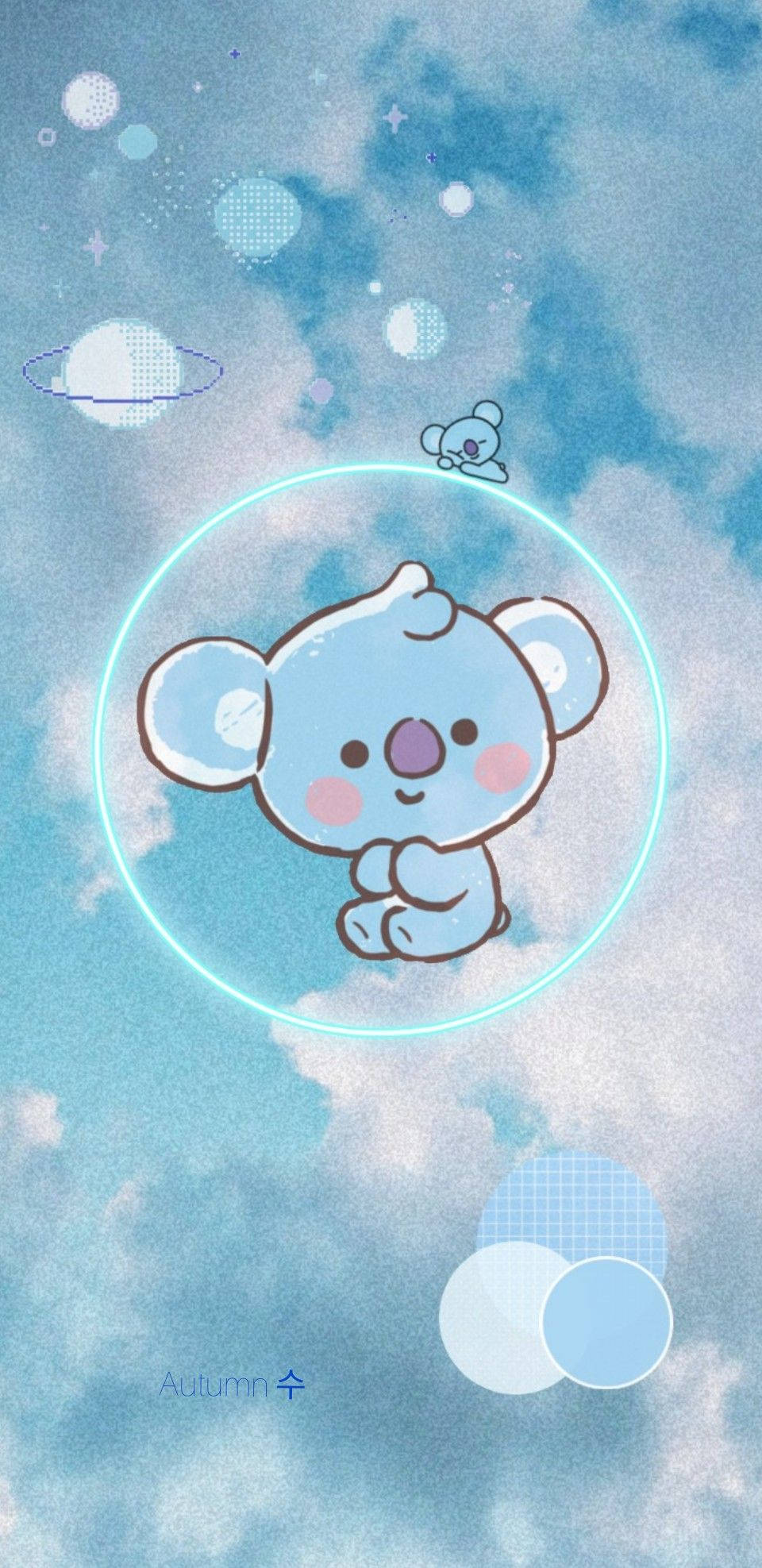 Koya 桌布 壁紙 — 一隻可愛的藍色無尾熊漂浮在發光的環中，置身於夢幻的粉彩天空，周圍有漂浮的行星和星星。