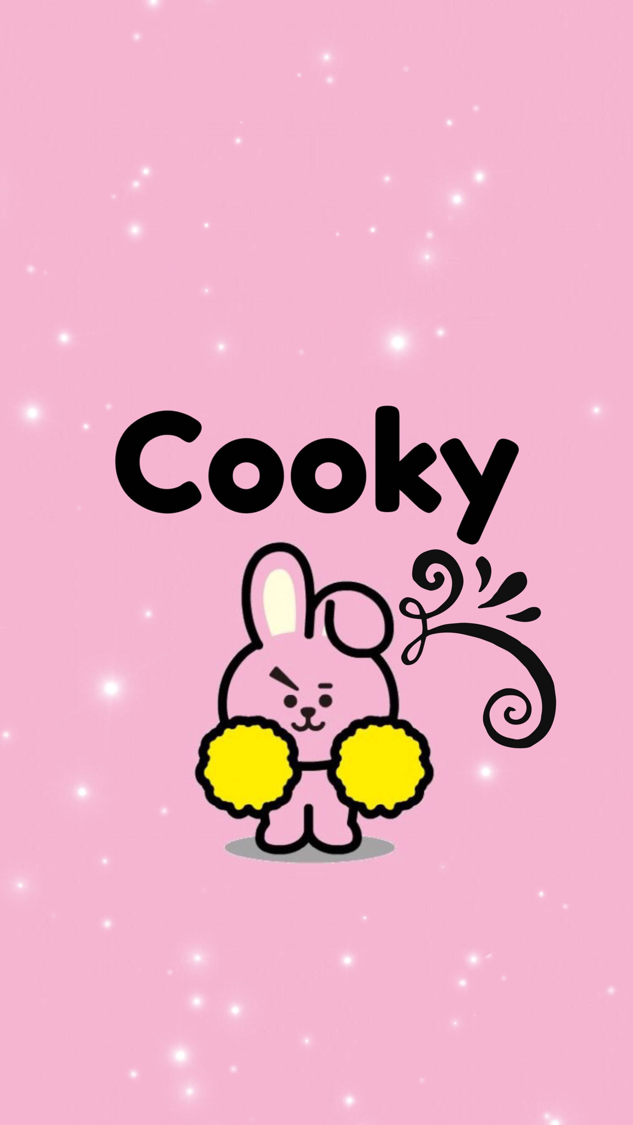 Cooky Bt21 桌布 壁紙 — 一隻名叫Cooky的可愛粉紅色卡通兔子在閃閃發光的粉紅色背景前拿著黃色絨球。