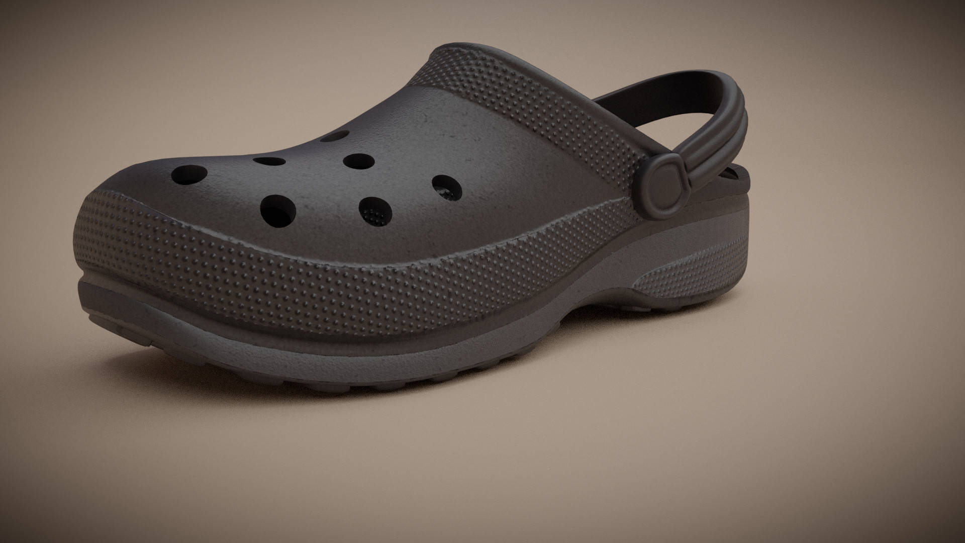 Crocs 桌布 壁紙 — 一隻單一啞光黑色木屐鞋，帶通風孔和紋理鞋底，孤立地放在溫暖的米色工作室背景上。