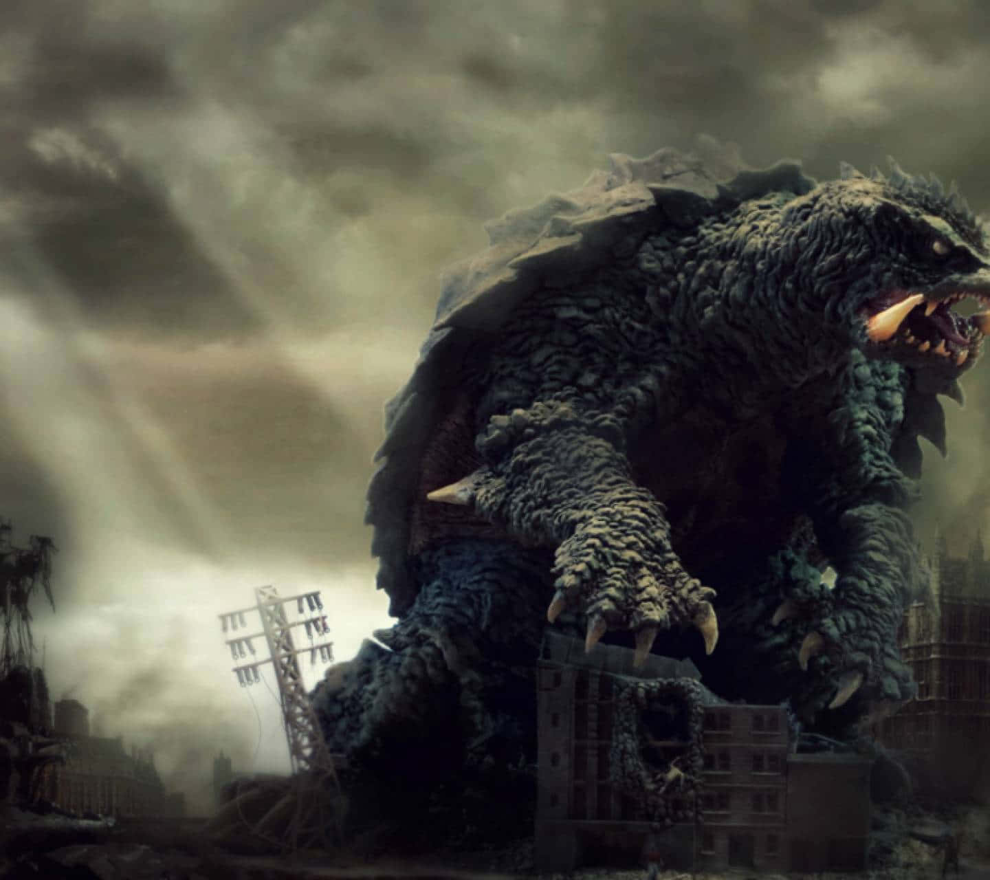 Gamera 桌布 壁紙 — 一隻巨大的哥吉拉在風暴般的灰色天空下，踩踏著被摧毀的城市景觀，被毀建築物冒出濃煙。
