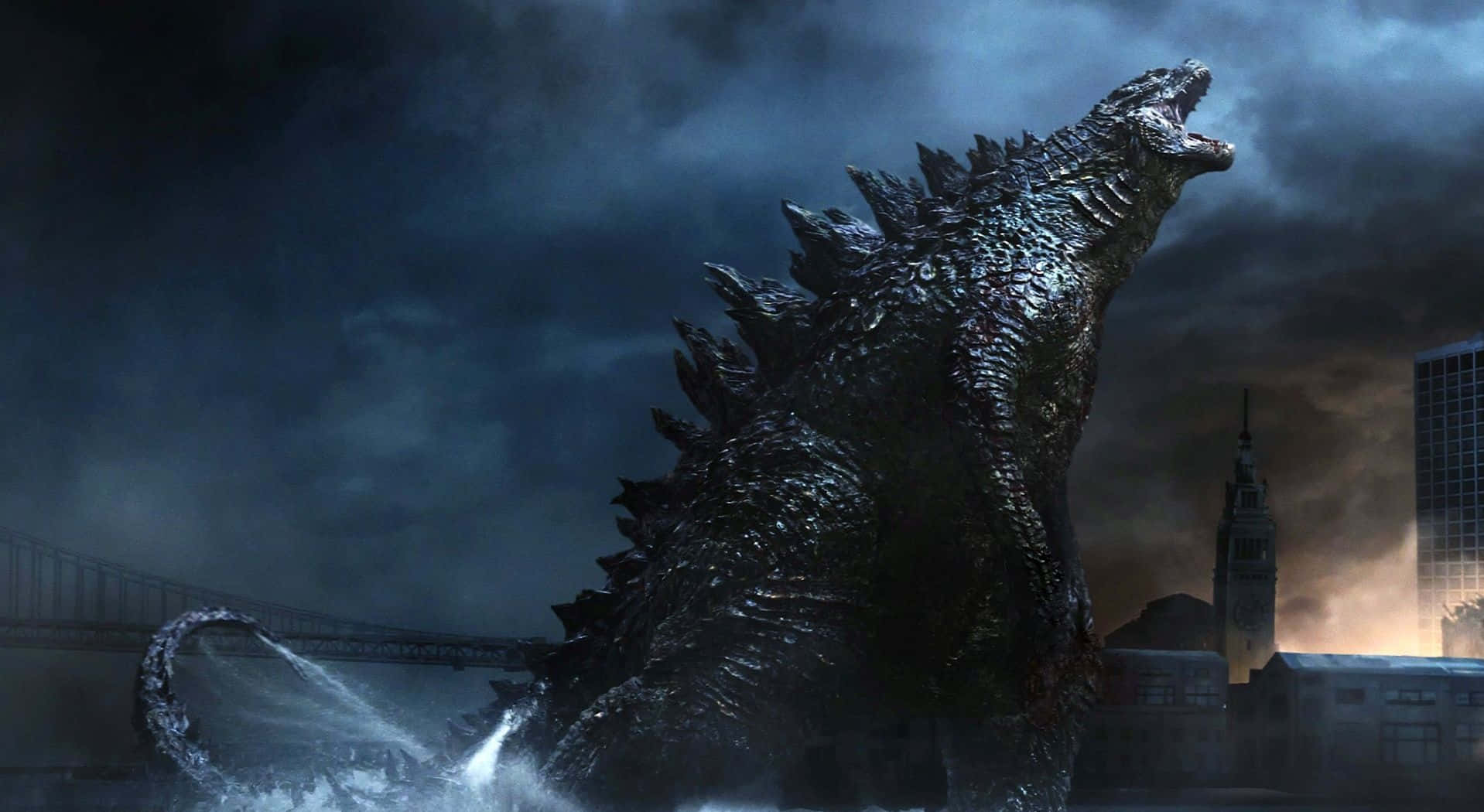 Godzilla 2014 桌布 壁紙 — 一隻巨大的哥吉拉從水中出現，置身於暴風雨中的城市景觀，高聳的建築物和陰暗不祥的天空。