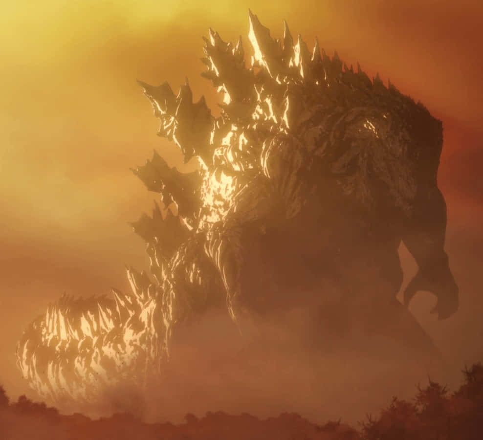 Burning Godzilla 桌布 壁紙 — 一隻巨大的哥吉拉從煙霧中出現，在火紅橙色的天空下，背鰭發光。