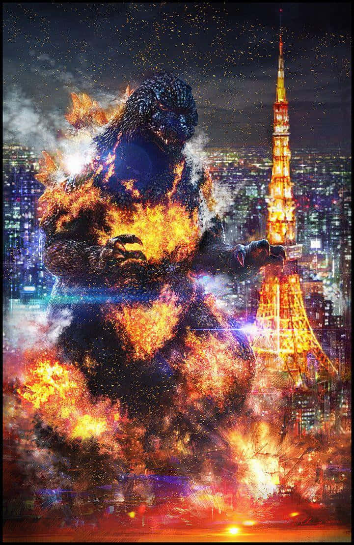 Burning Godzilla 桌布 壁紙 — 一隻巨大的哥吉拉被火焰爆炸吞噬，聳立在夜晚燃燒的東京天際線上，附近有亮燈的東京鐵塔。