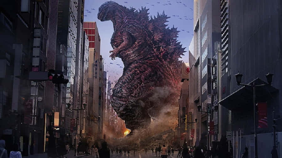 Godzilla City Destruction 桌布 壁紙 — 一隻巨大的哥吉拉踏過城市街道，壓碎建築物，碎片飛揚，驚慌的人群在下方逃竄。