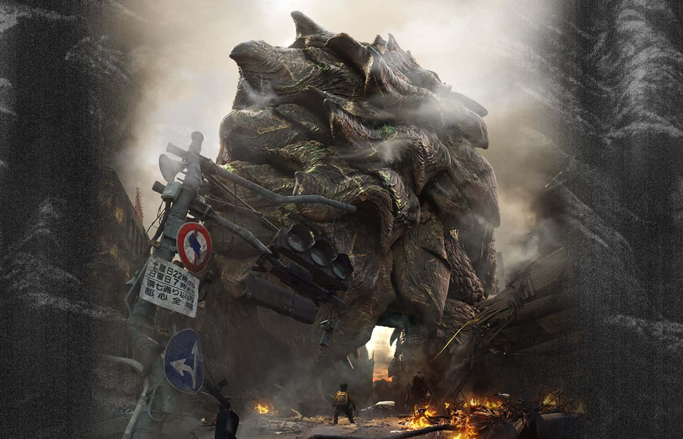 Gamera 桌布 壁紙 — 一隻巨大的怪物壓碎城市街道，火焰爆發，碎片在煙霧瀰漫的天空下飛舞。