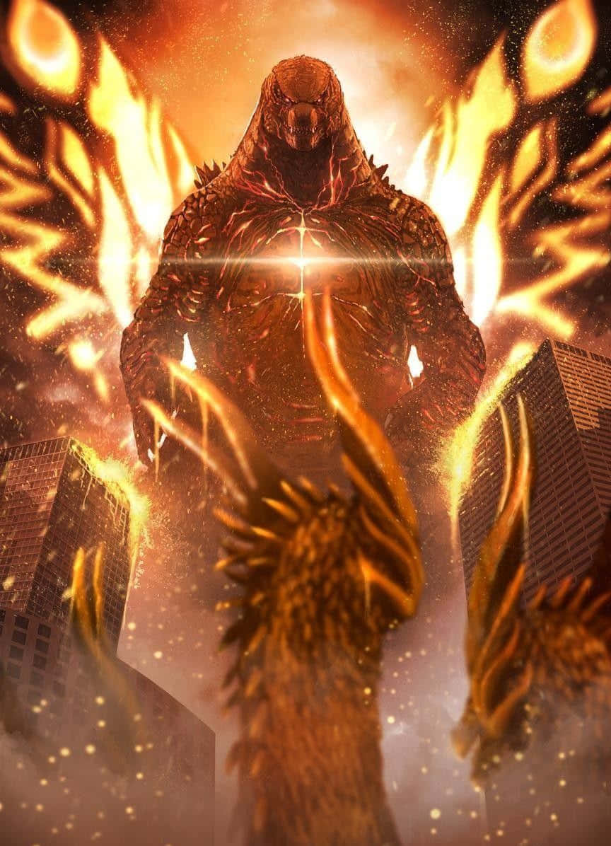 Burning Godzilla 桌布 壁紙 — 一隻巨大的火焰哥吉拉站立在燃燒的摩天大樓之間，散發出強烈的橙色火焰和發光的能量，營造出戲劇性的城市末日場景。