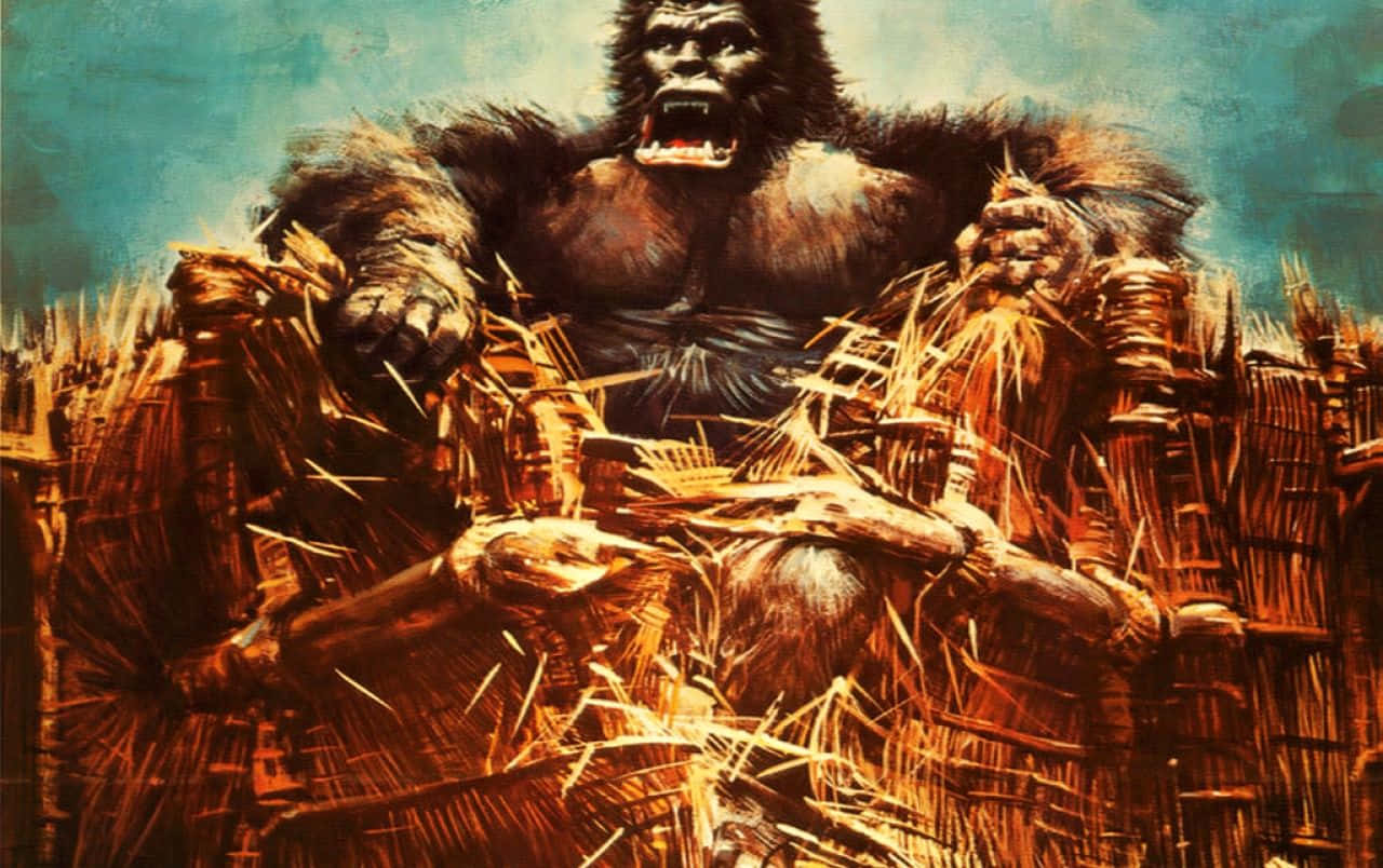 King Kong 桌布 壁紙 — 一隻巨大的猩猩咆哮著用爪子和牙齒撕碎木柵欄，背景是青綠色的天空。