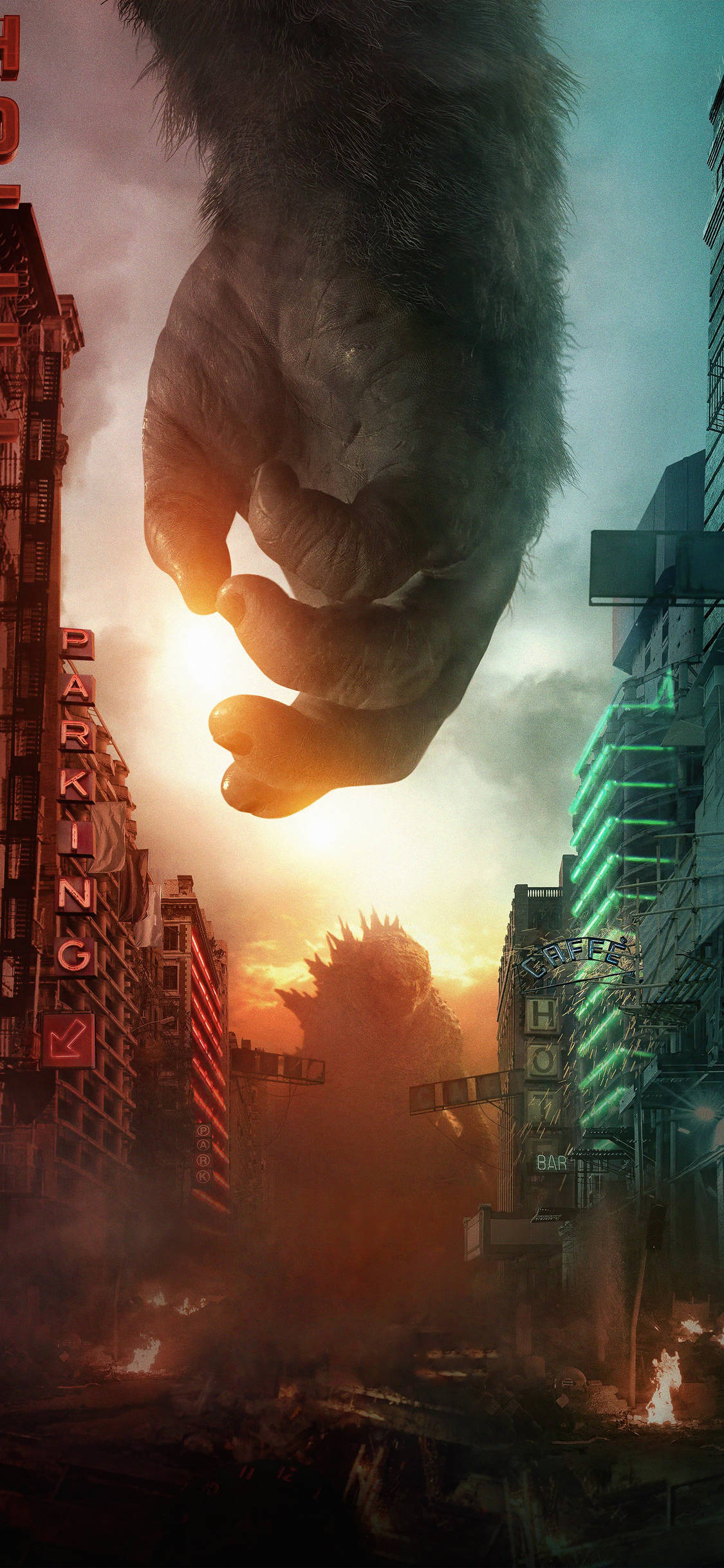 Godzilla Vs Kong 2021 桌布 壁紙 — 一隻巨猿的手籠罩著燃燒的城市，哥吉拉在熾熱的夕陽中升起。