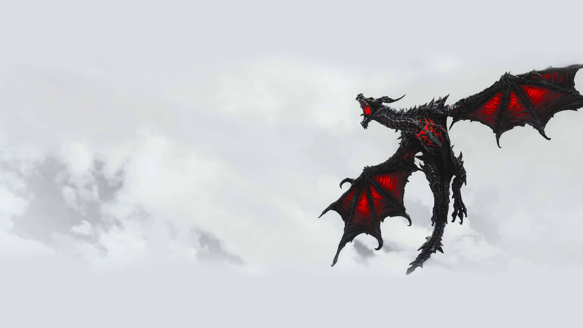 Skyrim Alduin 桌布 壁紙 — 一隻帶有發光紅色翅膀的威脅性黑色巨龍在陰暗的灰色天空中翱翔。