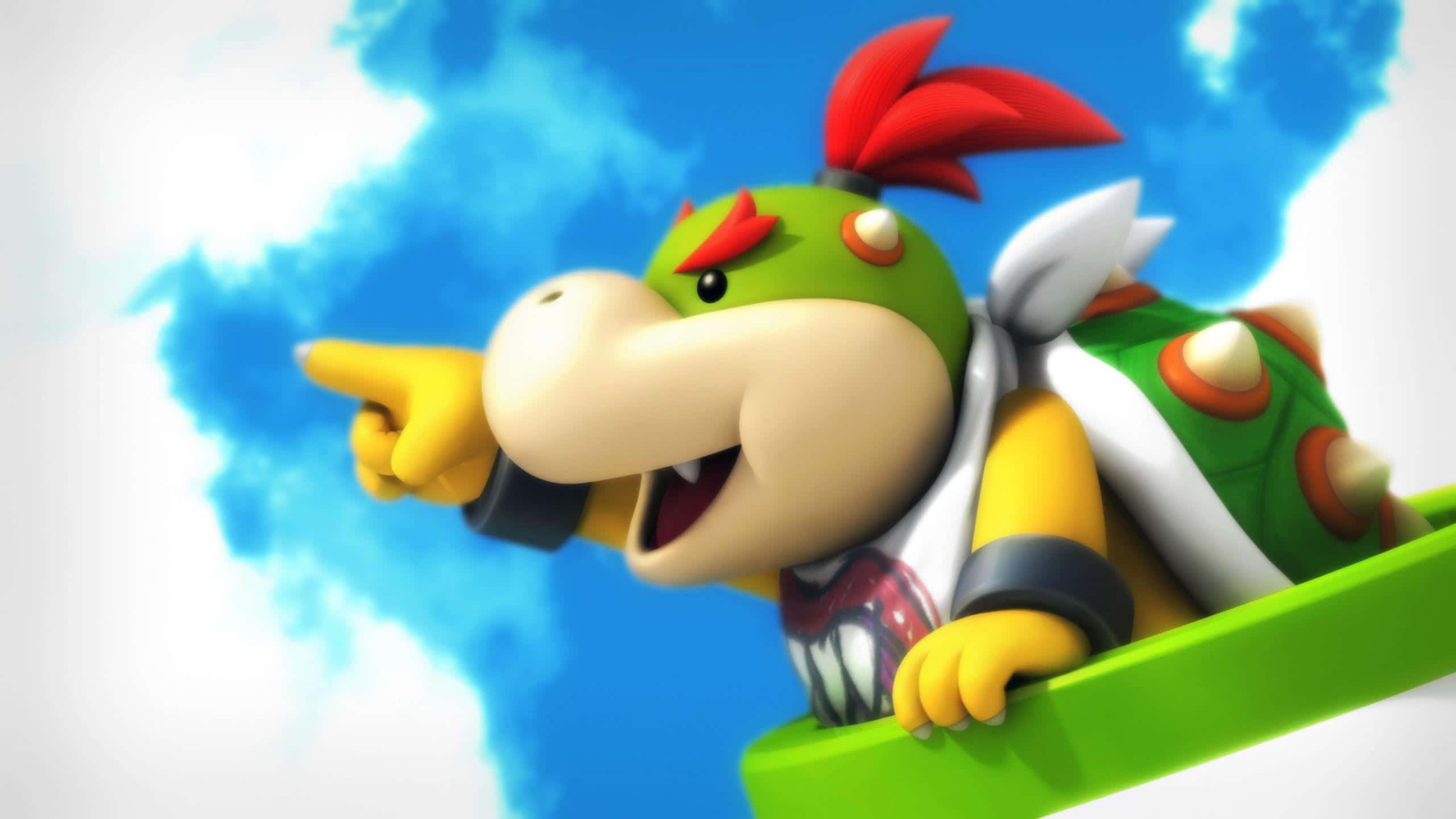 Bowser Jr 桌布 壁紙 — 一隻快樂的綠色Koopa Troopa在殼中指向前方，背景是帶有 fluffy 雲朵的明亮藍天。
