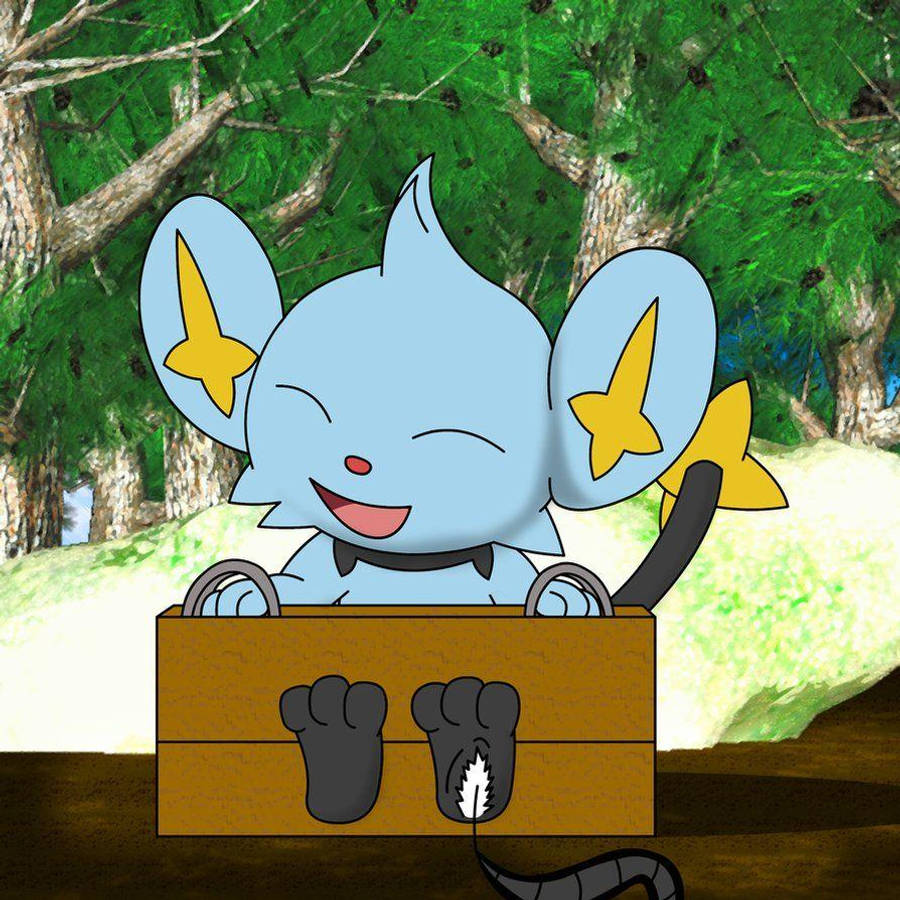 Shinx 桌布 壁紙 — 一隻快樂的藍色卡通老鼠，長著黃色星星耳朵，在茂密的綠色森林中從一個木箱裡高興地探出頭來。