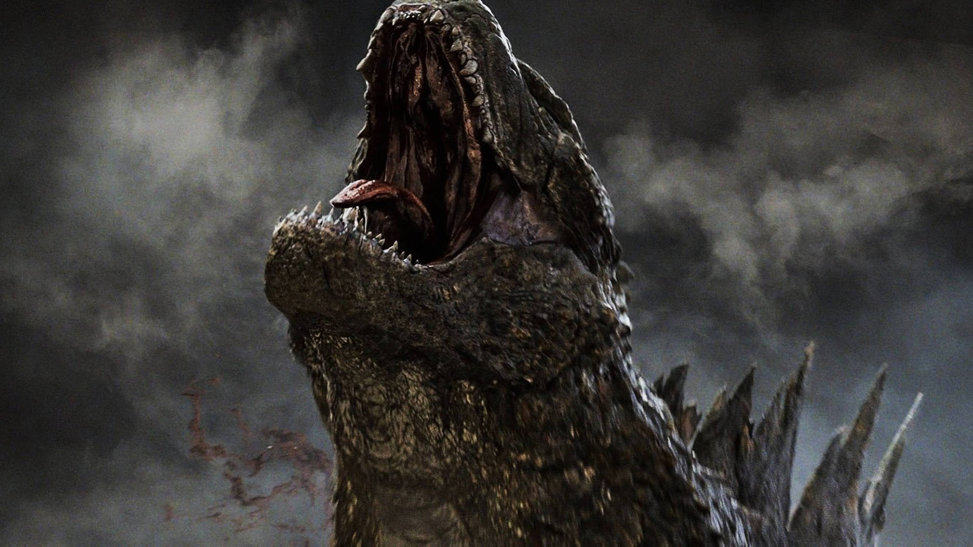 shin godzilla 桌布 壁紙 — 一隻怪獸哥吉拉張開大嘴，對著暴風雨的灰色天空咆哮。