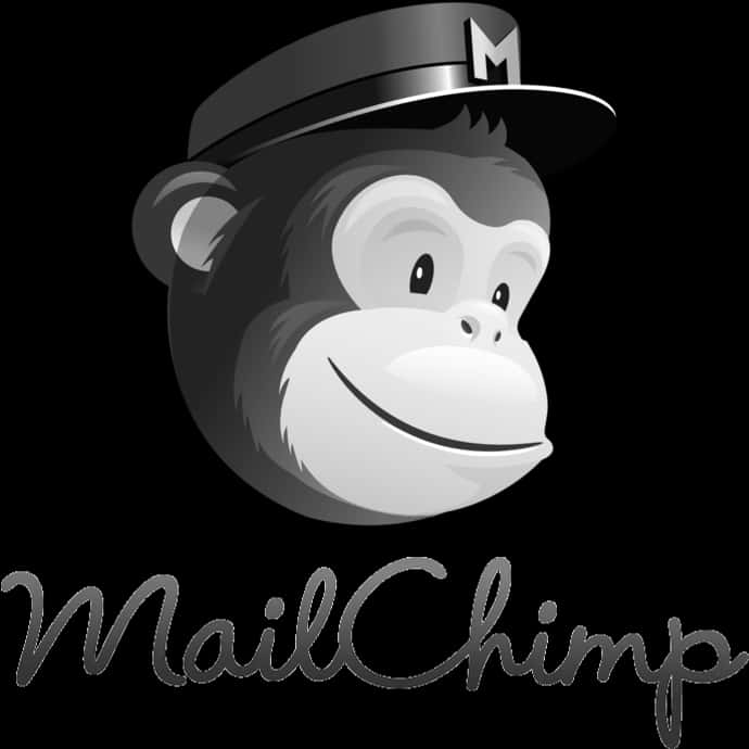 Email 桌布 壁紙 — 一隻戴著帶有M標誌帽子的快樂卡通猴子，在黑色背景上微笑，下方有MailChimp字樣。